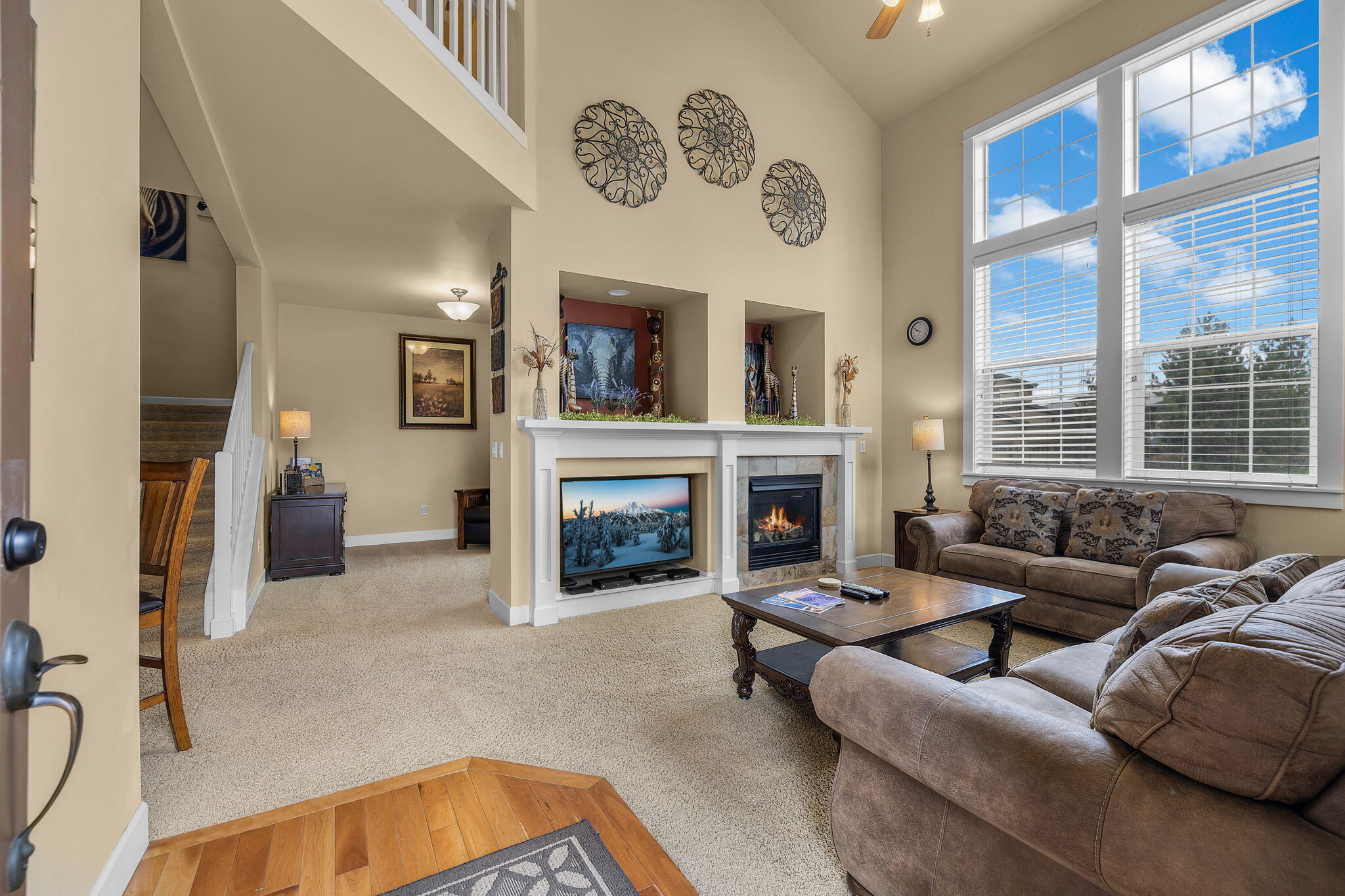 935 Southwest Chamberlain Street Bend, OR 97702 - Photo 4 of 33 Great Room with soaring ceilings and lots of natural light.