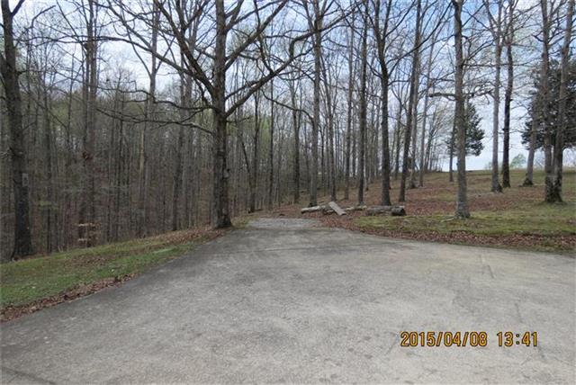 701 Edenway Road Dover, TN 37058 - Photo 3 of 13 Additional concrete parking area.