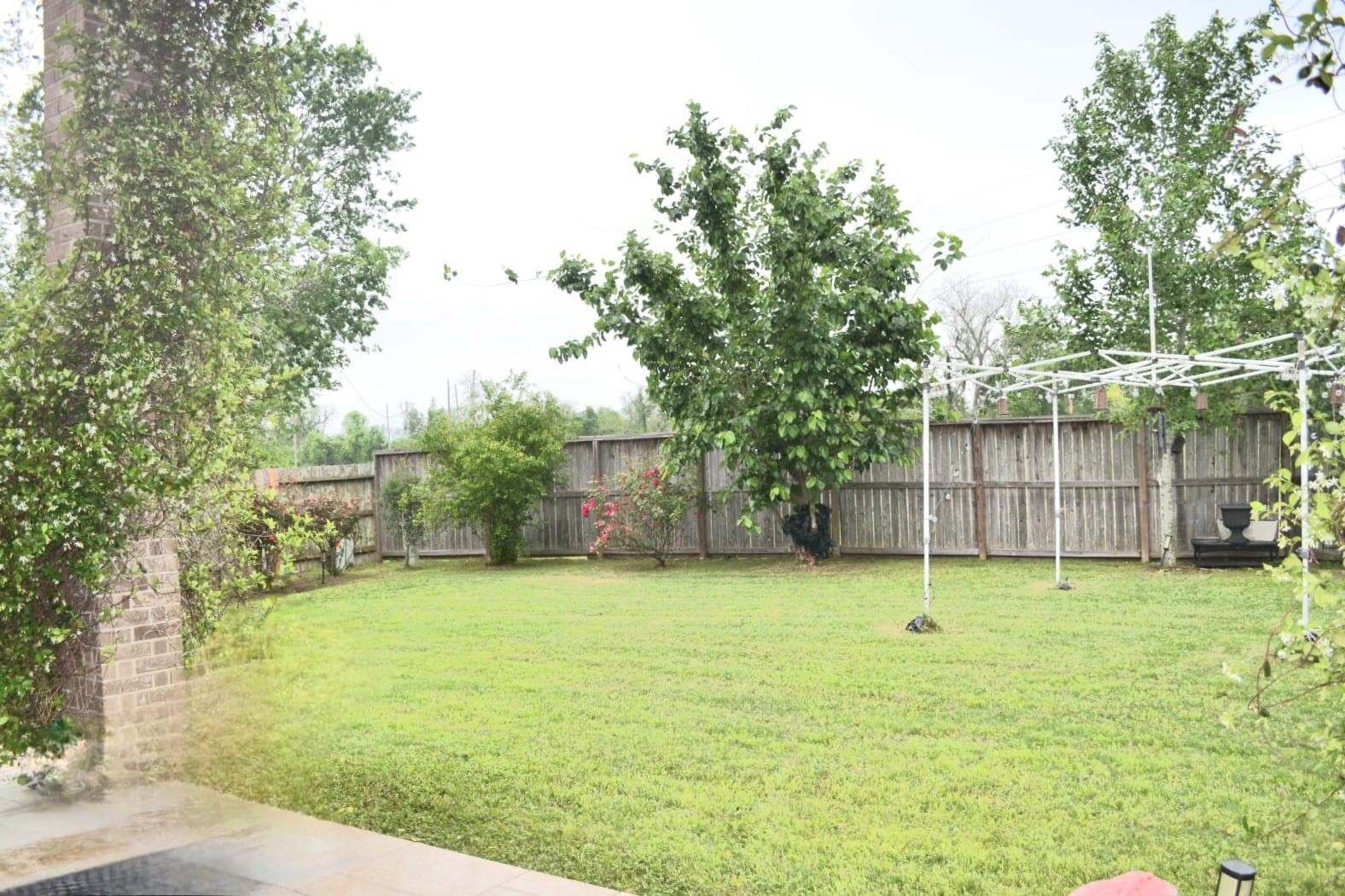 5206 Jacob Ridge Court Sugar Land, TX 77479 - Photo 42 of 42 a view of a backyard with a garden and entertaining space