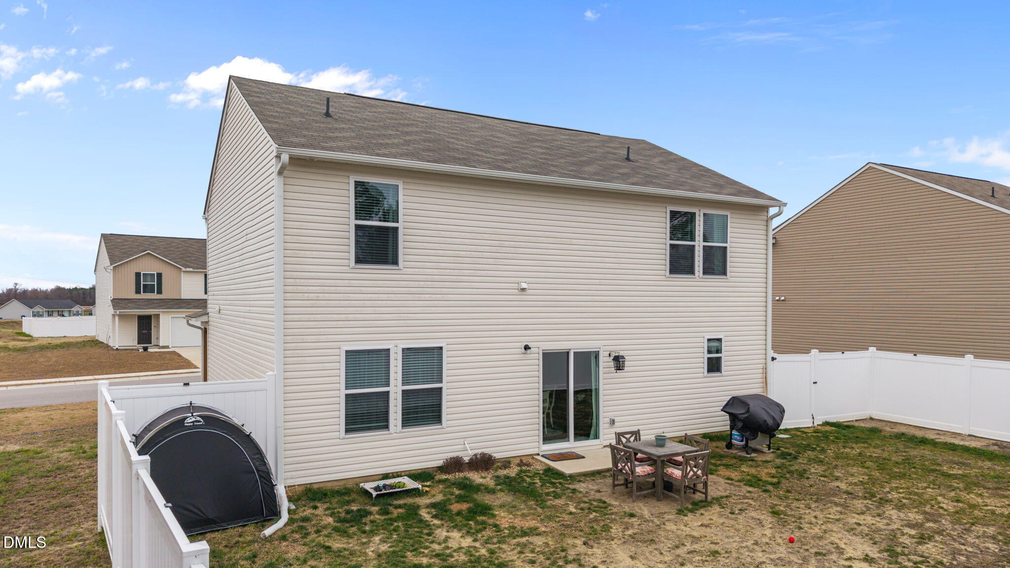 433 Silo Court Ayden, NC 28513 - Photo 5 of 38 a backyard of a house with table and chairs