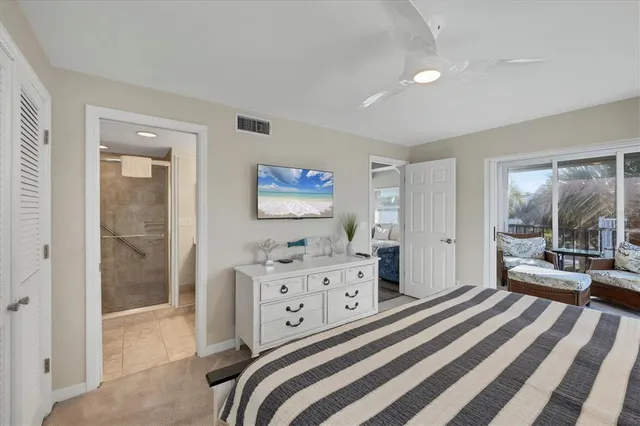 a bathroom with a double vanity sink mirror and shower