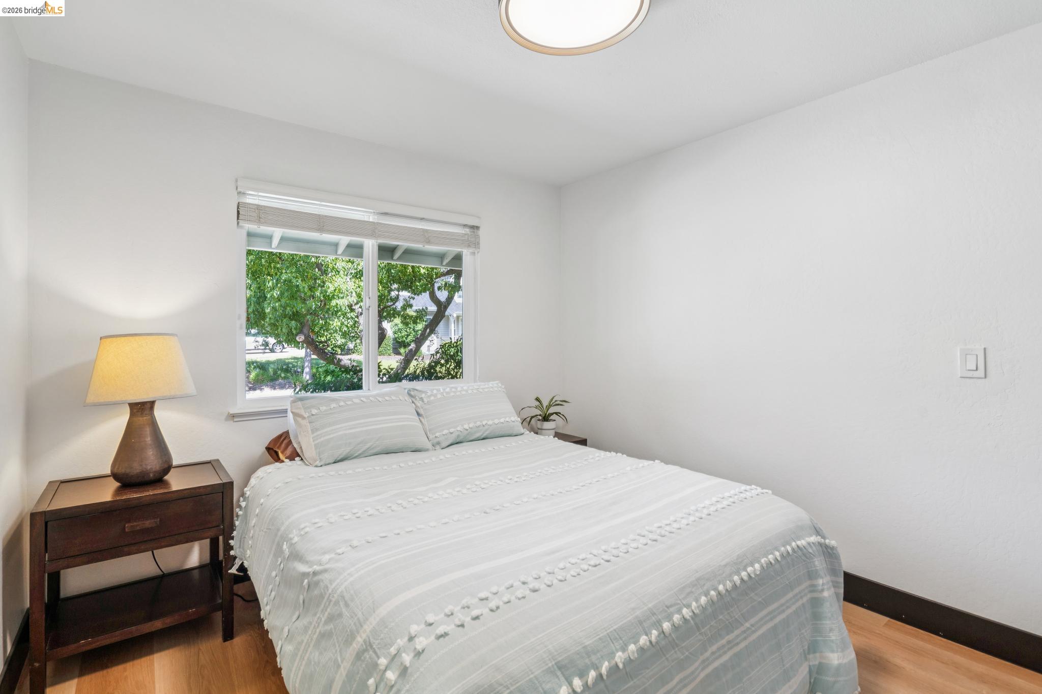 3093 Diablo View Road Pleasant Hill, CA 94523 - Photo 18 of 43 Bedroom featuring light wood-style floors and baseboards