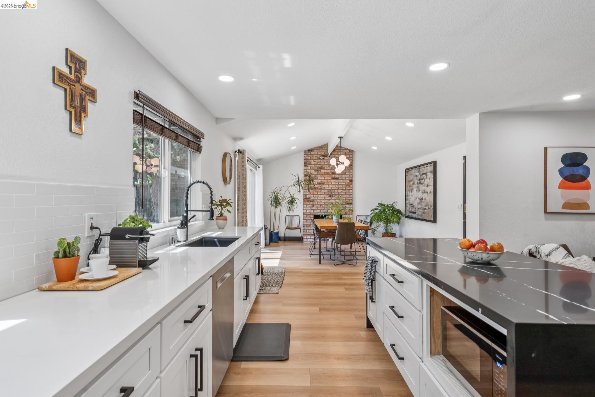 3093 Diablo View Road Pleasant Hill, CA 94523 - Photo 19 of 43 Kitchen featuring white cabinets, dark stone countertops, light wood-style floors, recessed lighting, and black microwave
