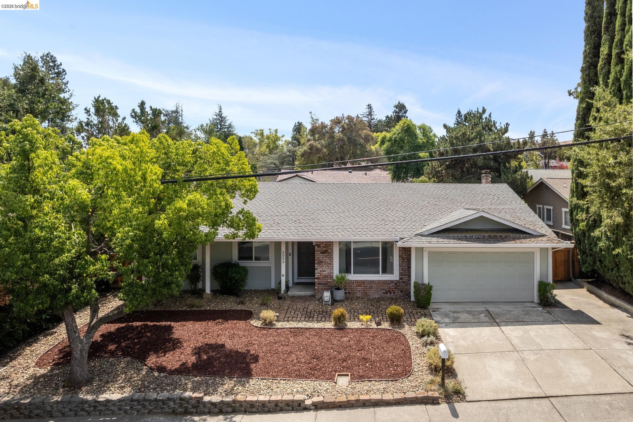 3093 Diablo View Road Pleasant Hill, CA 94523 - Photo 37 of 43 Single story home featuring roof with shingles, an attached garage, brick siding, and concrete driveway