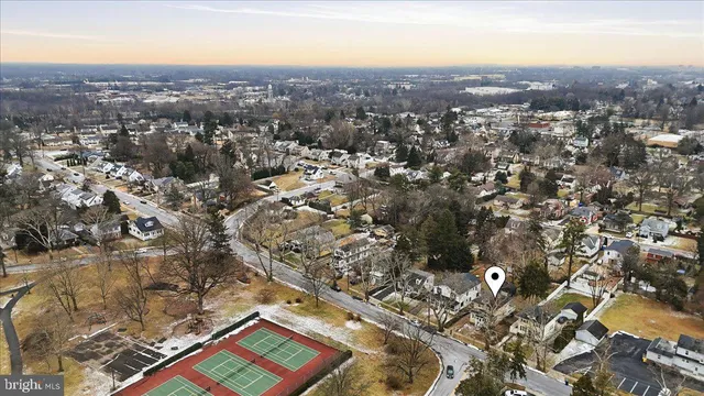 an aerial view of residential house with parking space