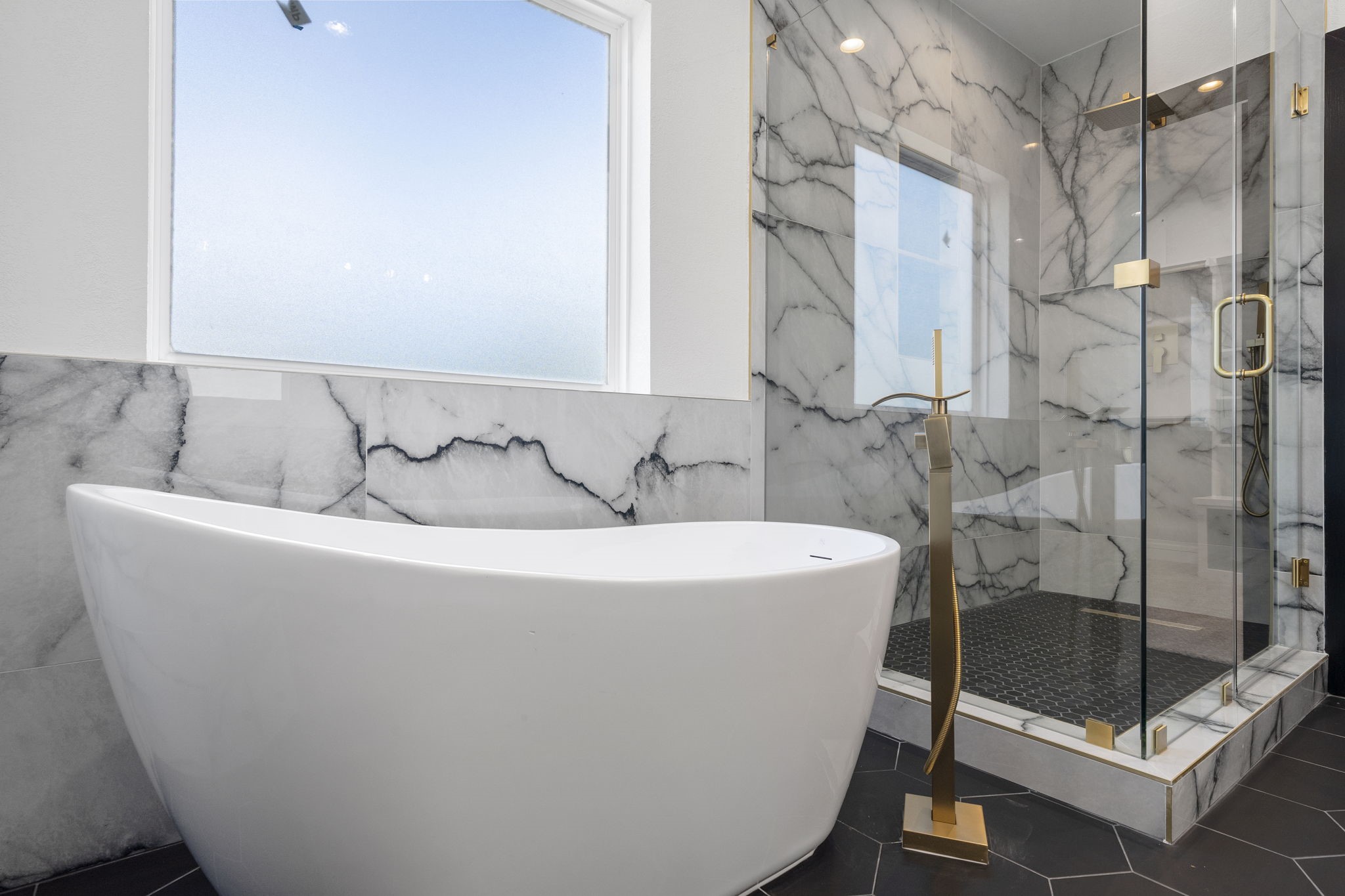 4437 Gunter Street, Unit AB Houston, TX 77020 - Photo 14 of 20 a bathroom with a bathtub and shower