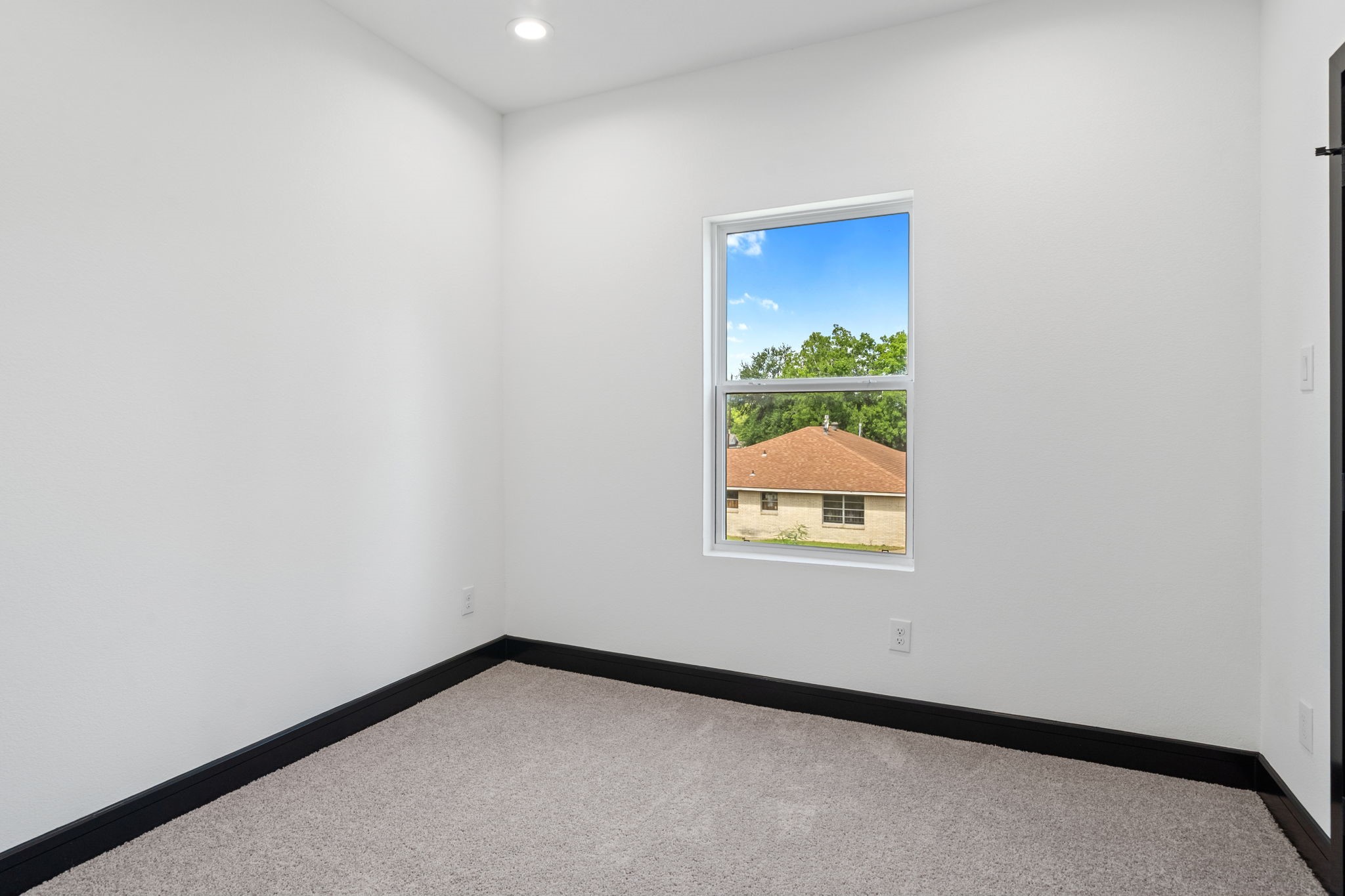 4437 Gunter Street, Unit AB Houston, TX 77020 - Photo 16 of 20 a view of an empty room and window