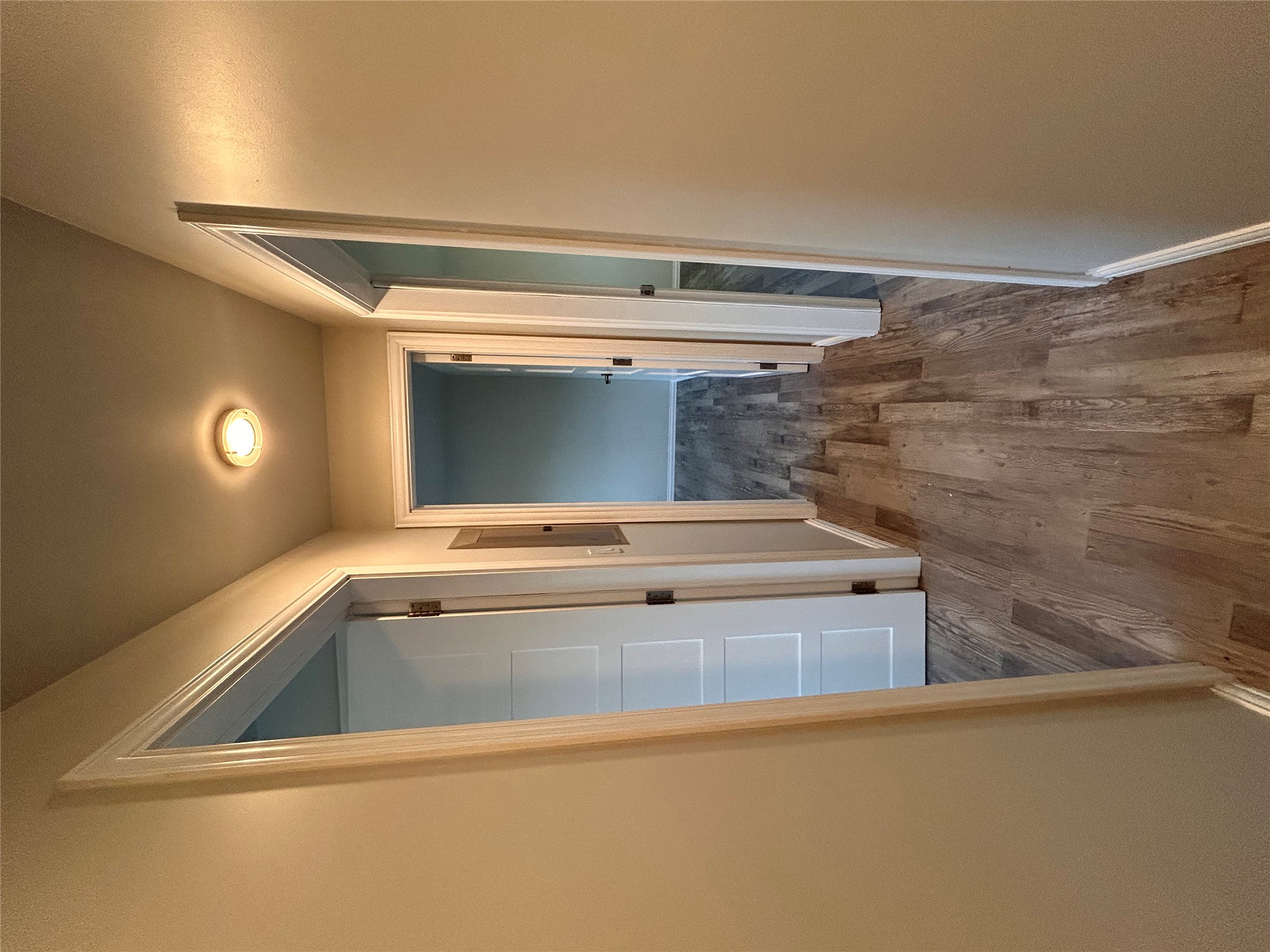 8920 Trone Circle, Unit B Austin, TX 78758 - Photo 12 of 19 a view of hallway with wooden floor