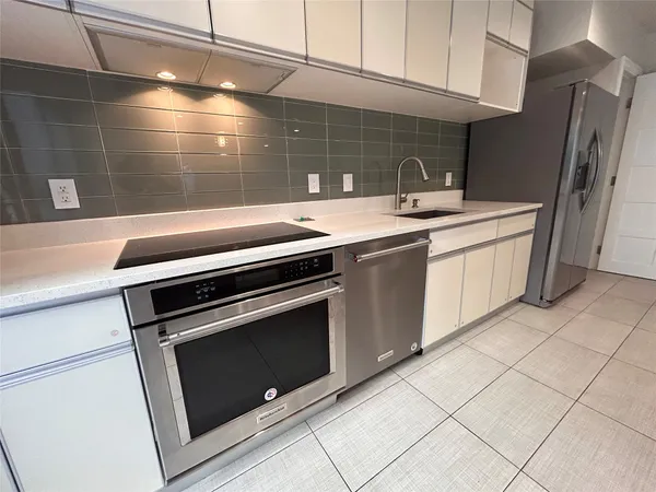 a view of kitchen with windows