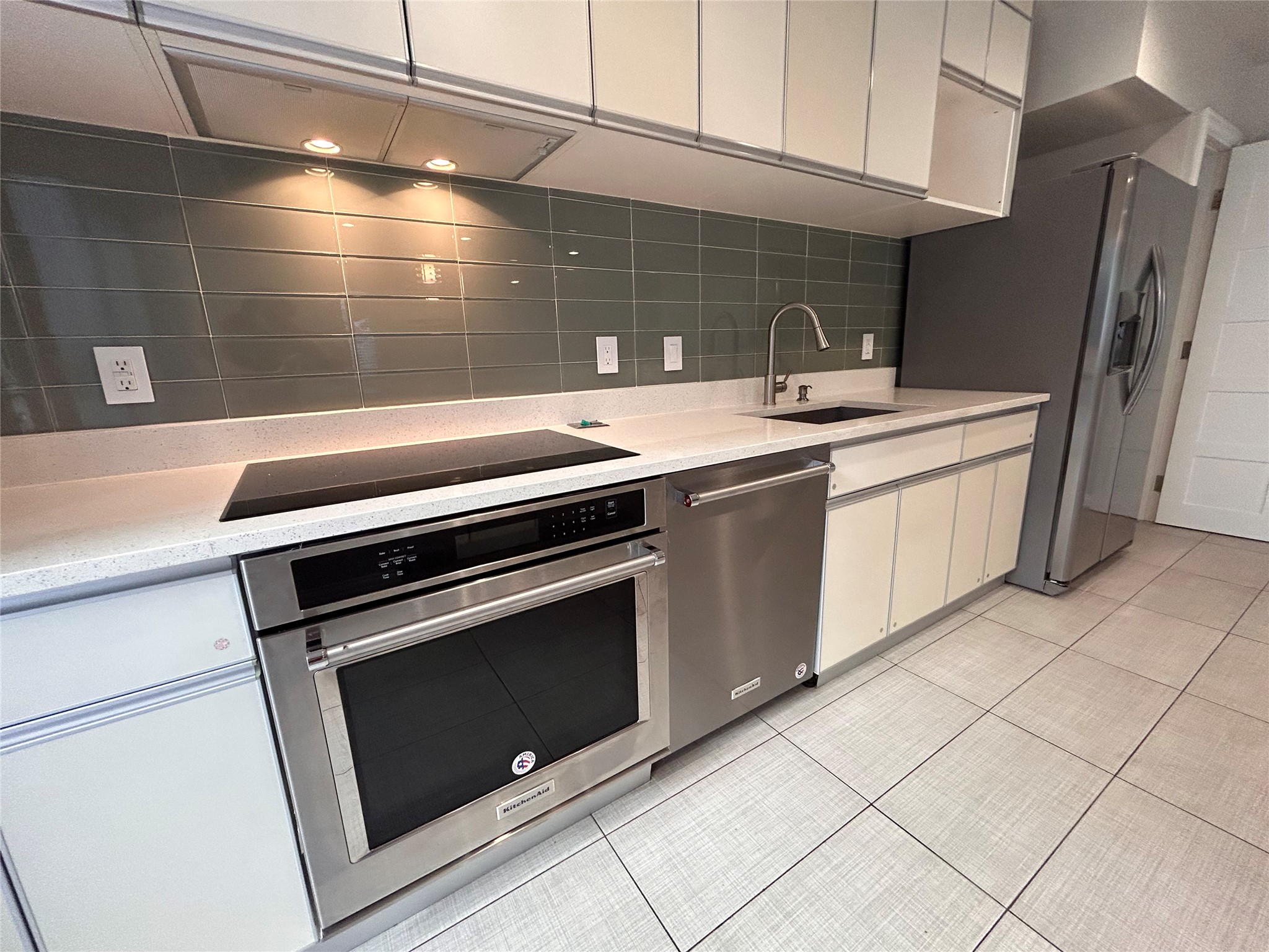 8920 Trone Circle, Unit B Austin, TX 78758 - Photo 6 of 19 a kitchen with stainless steel appliances a sink stove and cabinets