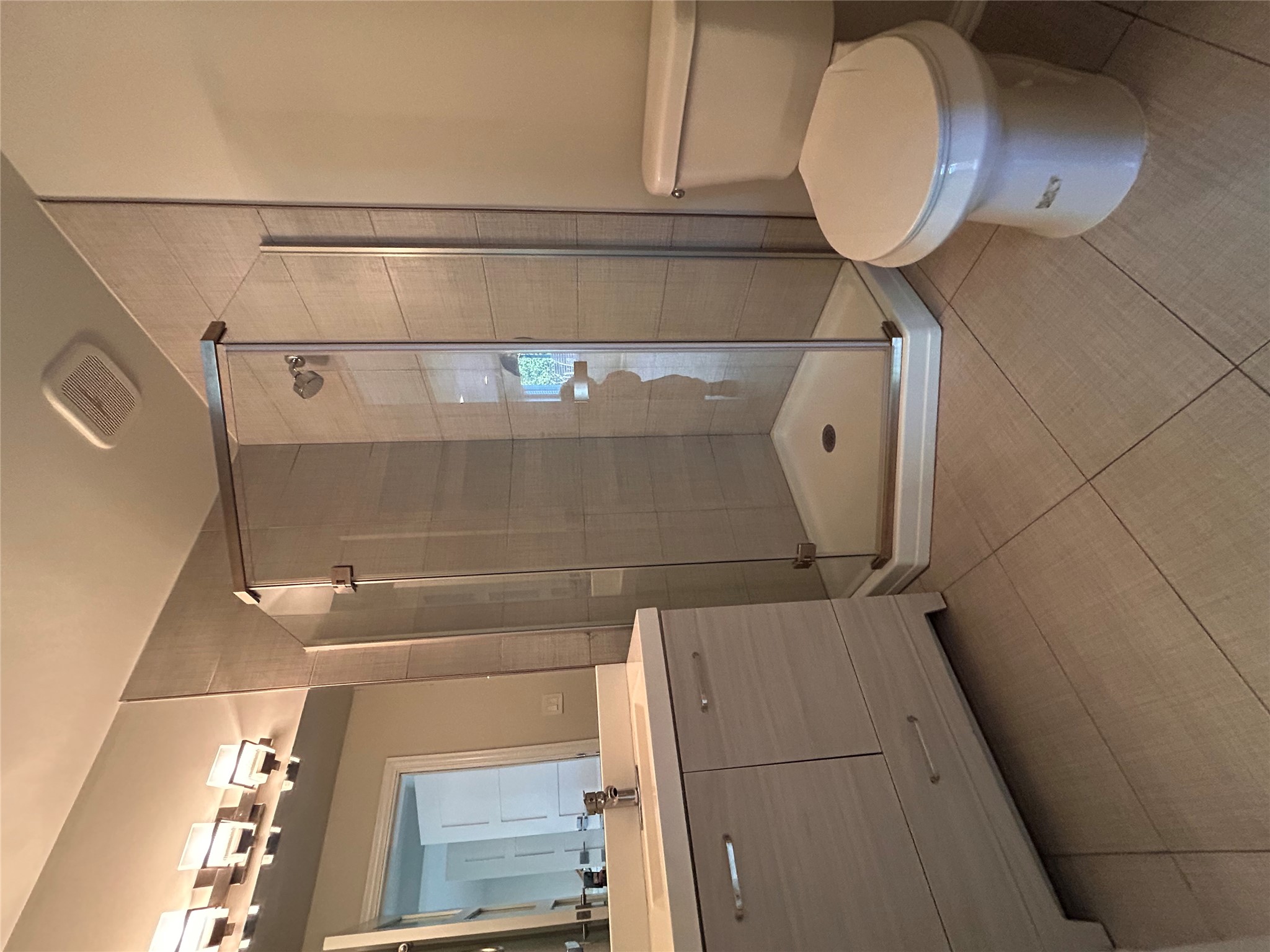 8920 Trone Circle, Unit B Austin, TX 78758 - Photo 8 of 19 a bathroom with a sink toilet and shower