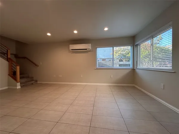 a bathroom with a sink a toilet a mirror and bathtub