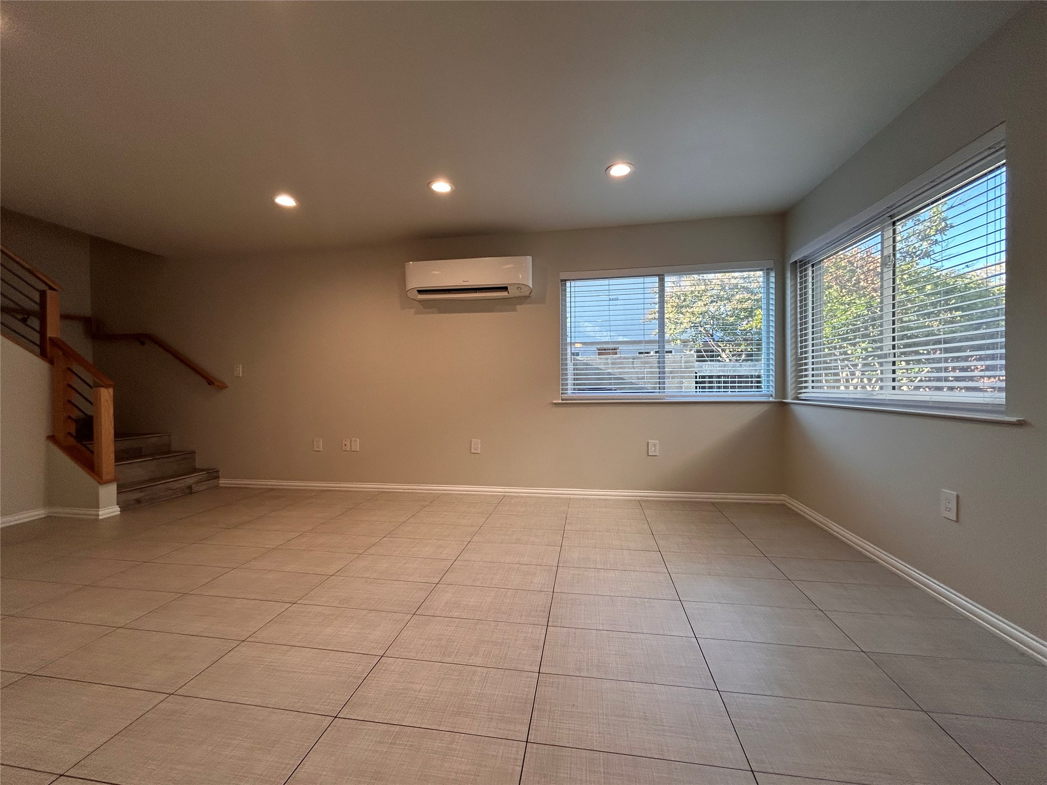 8920 Trone Circle, Unit B Austin, TX 78758 - Photo 9 of 19 a view of an empty room with a window
