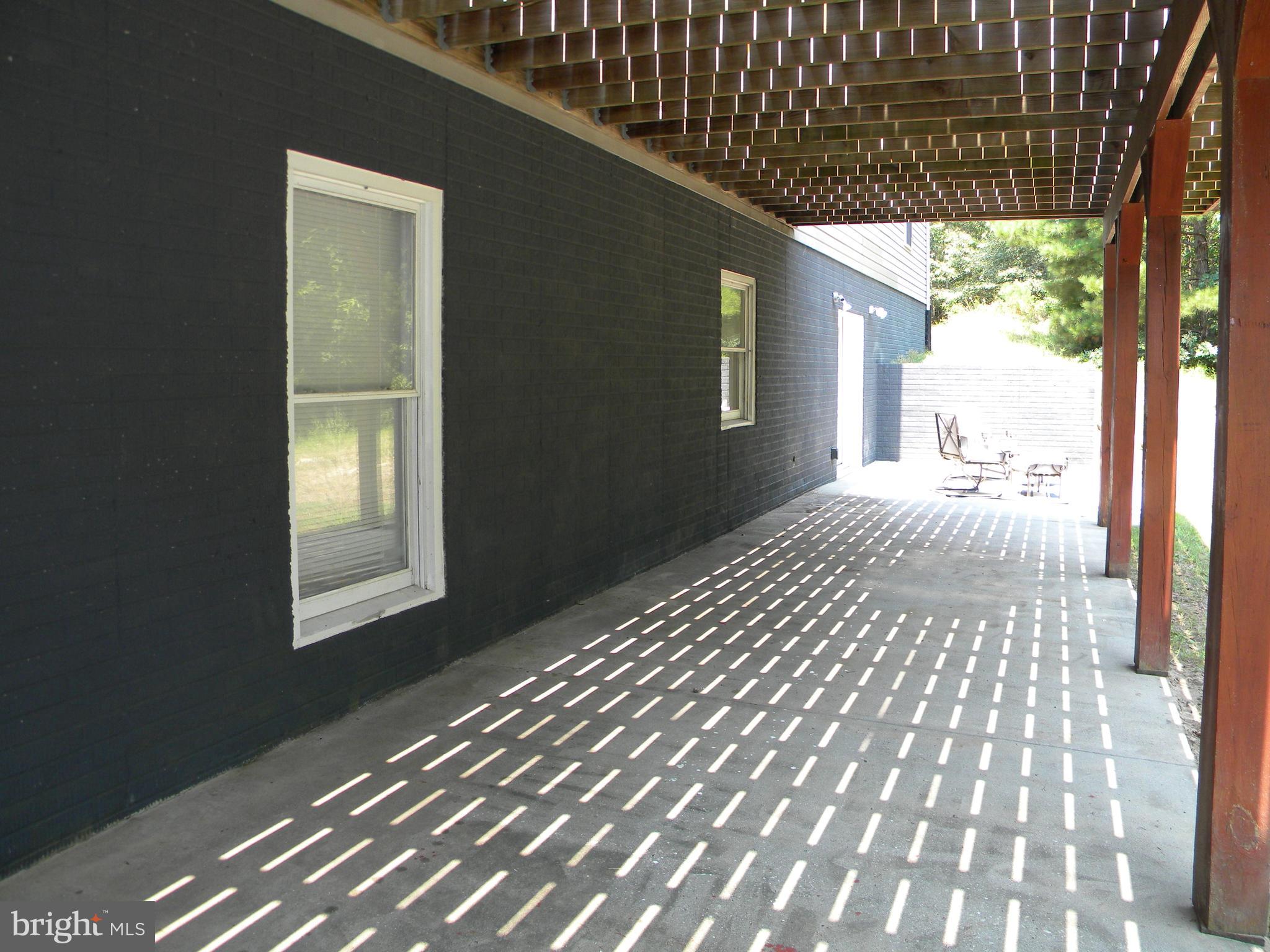 13401 Prim Road King George, VA 22485 - Photo 11 of 69 Concrete patio shaded by upper deck!