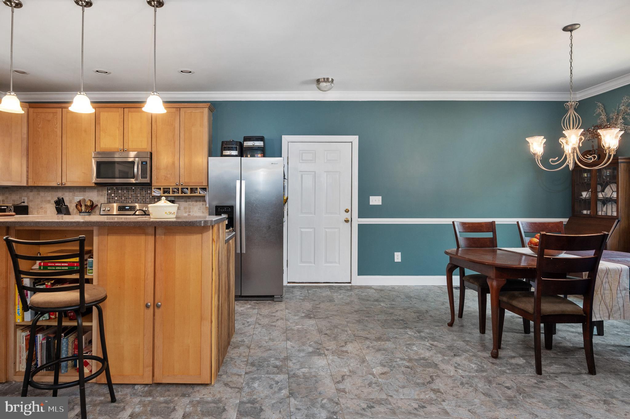13401 Prim Road King George, VA 22485 - Photo 21 of 69 Crown molding, chair rail & recessed lights!