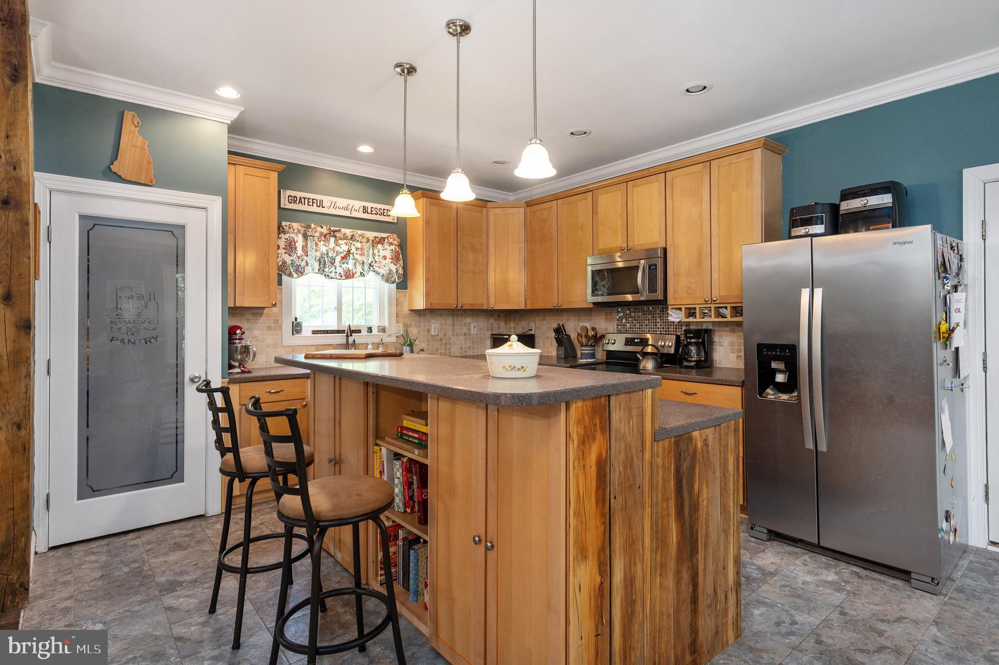 13401 Prim Road King George, VA 22485 - Photo 22 of 69 Custom island w/stool seating & pendant lights!
