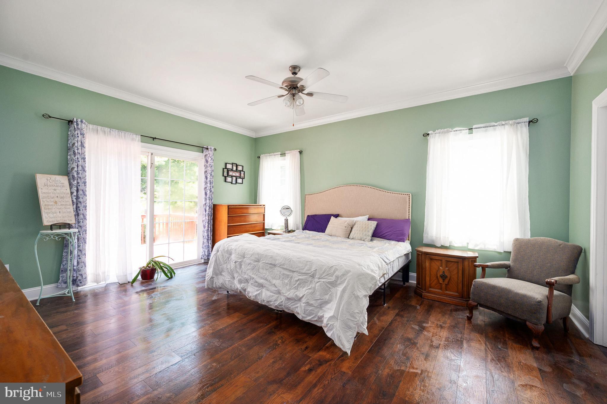 13401 Prim Road King George, VA 22485 - Photo 34 of 69 Lovely primary bedroom with access to rear deck!