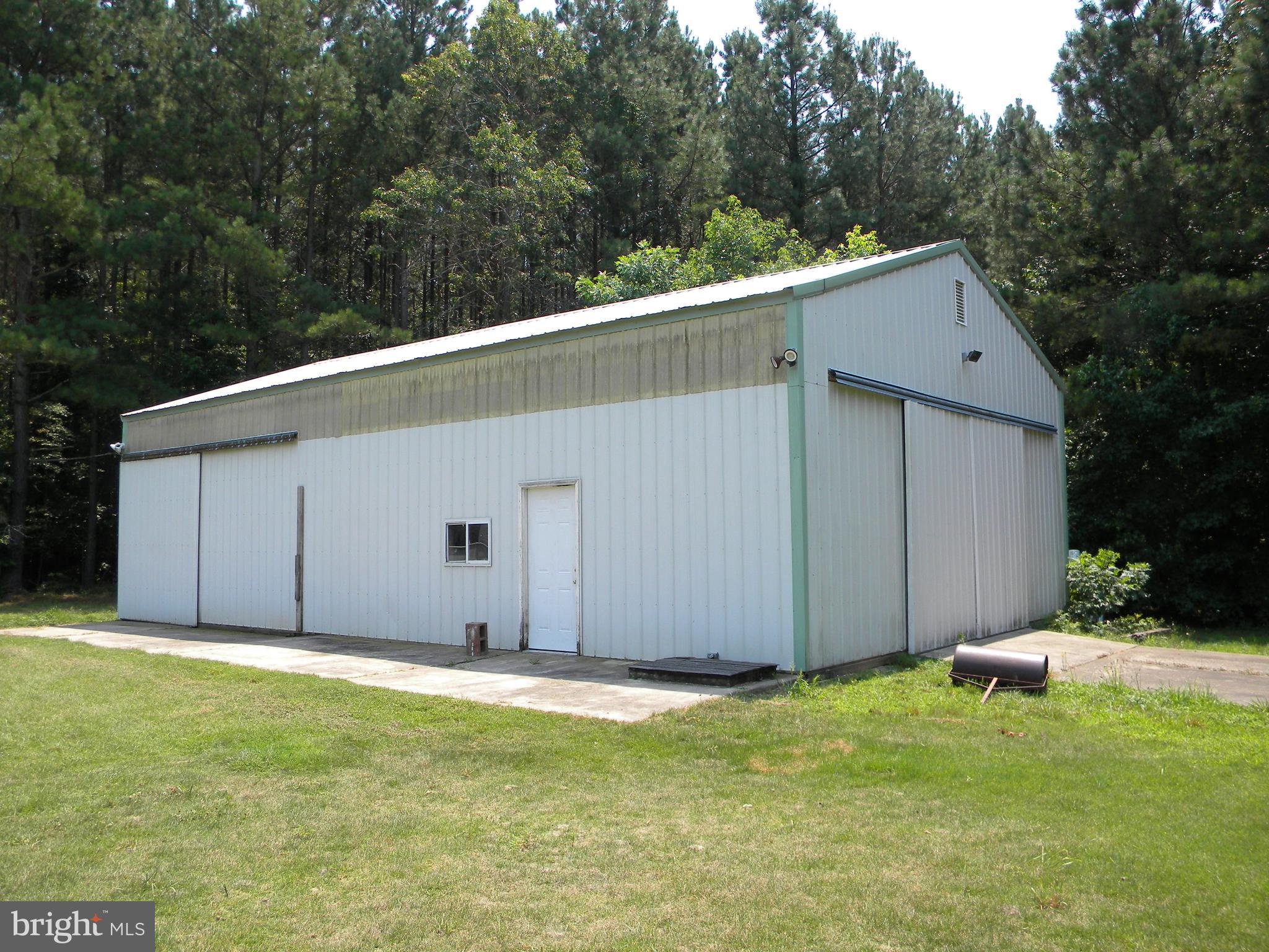 13401 Prim Road King George, VA 22485 - Photo 58 of 69 10x50 concrete pad outside workspace!