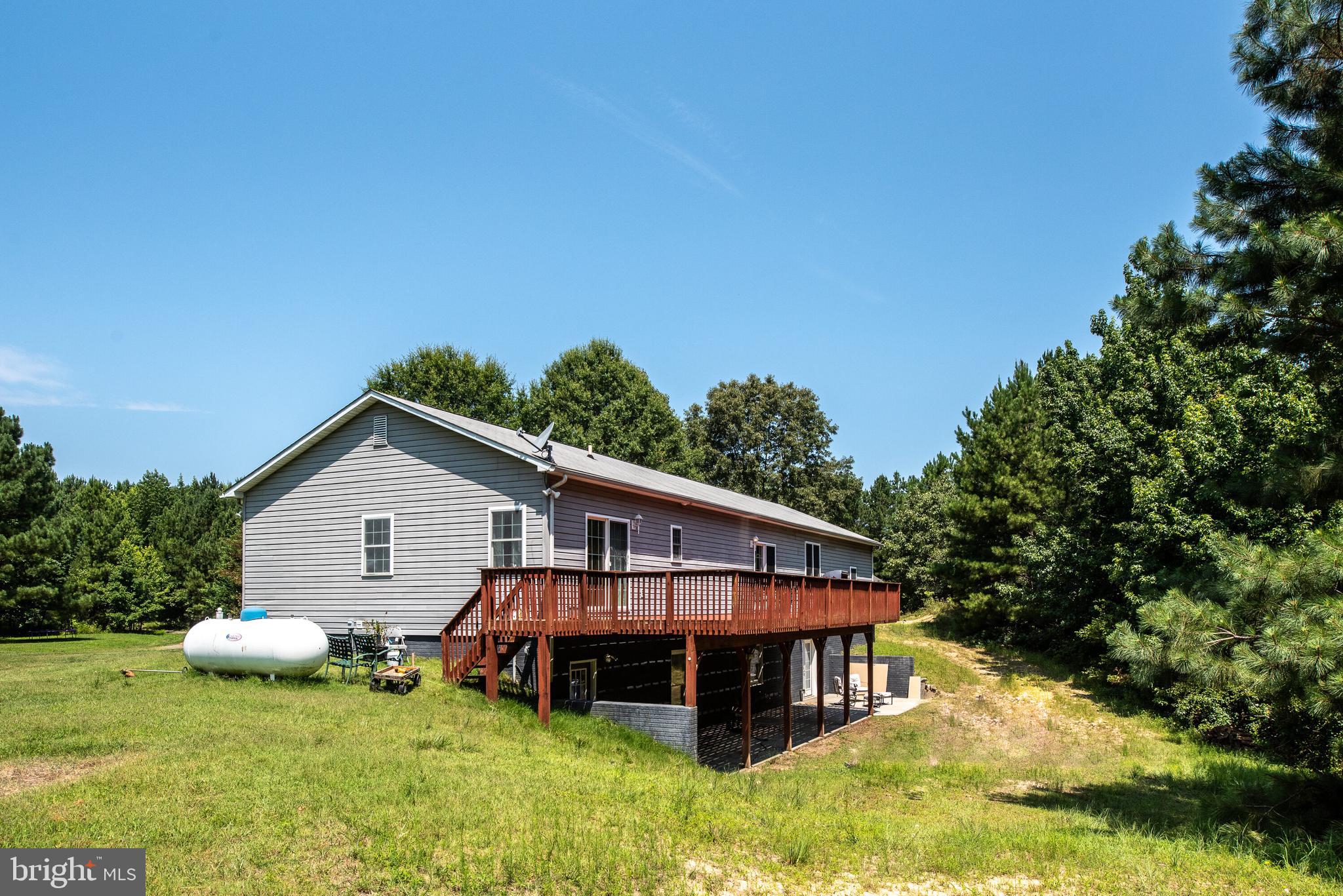 13401 Prim Road King George, VA 22485 - Photo 7 of 69 Huge rear deck with concrete patio!