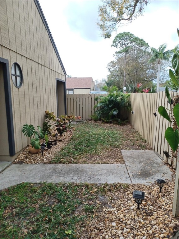 Undisclosed Address Vero Beach, FL 32960 - Photo 3 of 18 a view of a back yard of the house