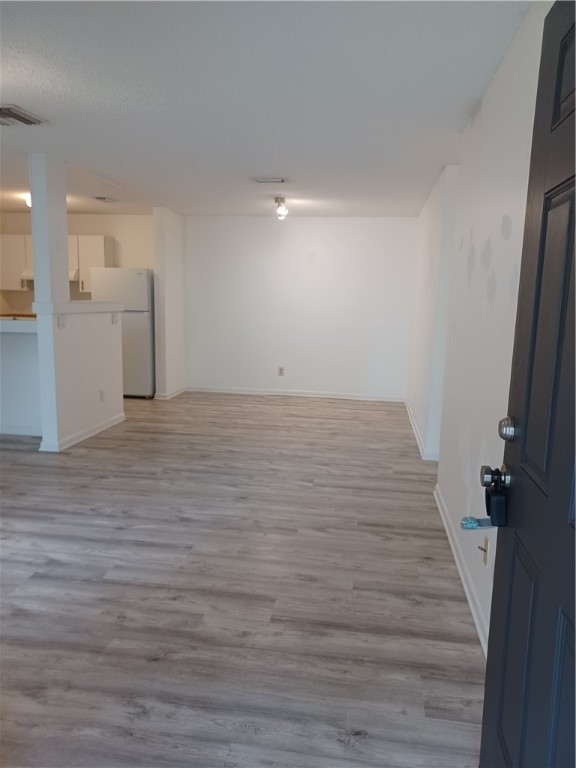 Undisclosed Address Vero Beach, FL 32960 - Photo 5 of 18 a view of a livingroom with wooden floor