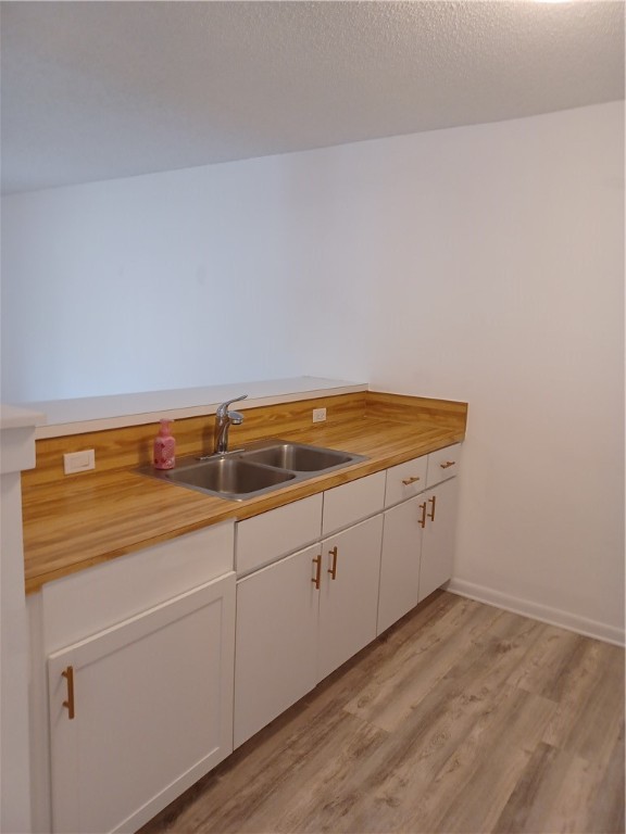 Undisclosed Address Vero Beach, FL 32960 - Photo 8 of 18 a view of a kitchen with wooden floor