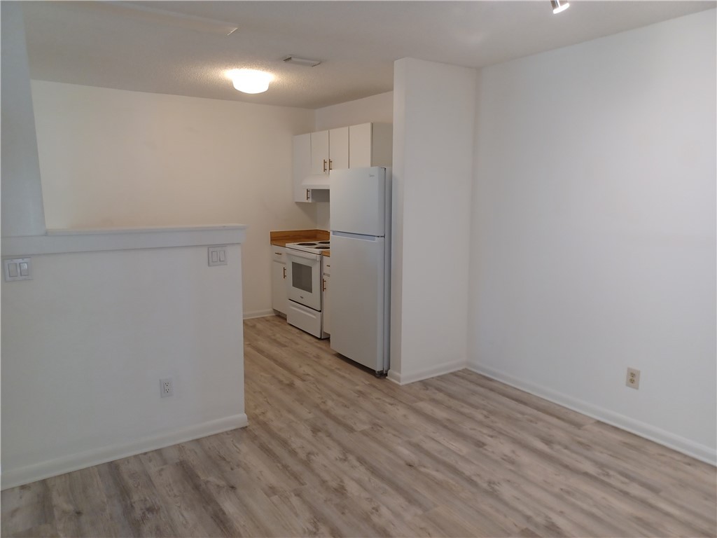 Undisclosed Address Vero Beach, FL 32960 - Photo 9 of 18 a view of a kitchen with a sink