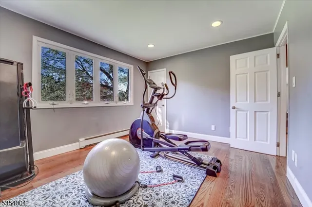 a room with furniture and wooden floor