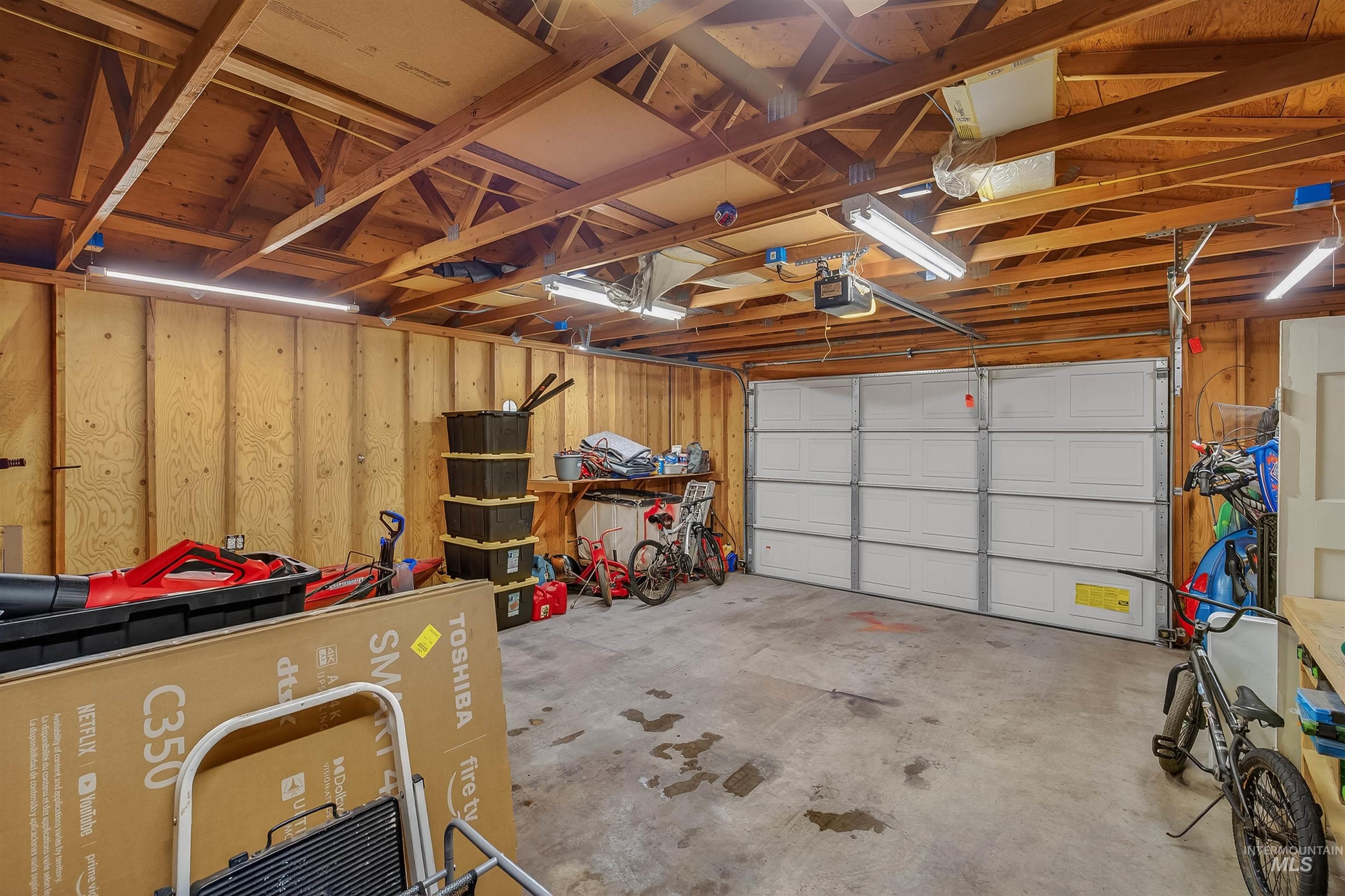 835 12th Street Clarkston, WA 99403 - Photo 34 of 39 Garage featuring wooden walls