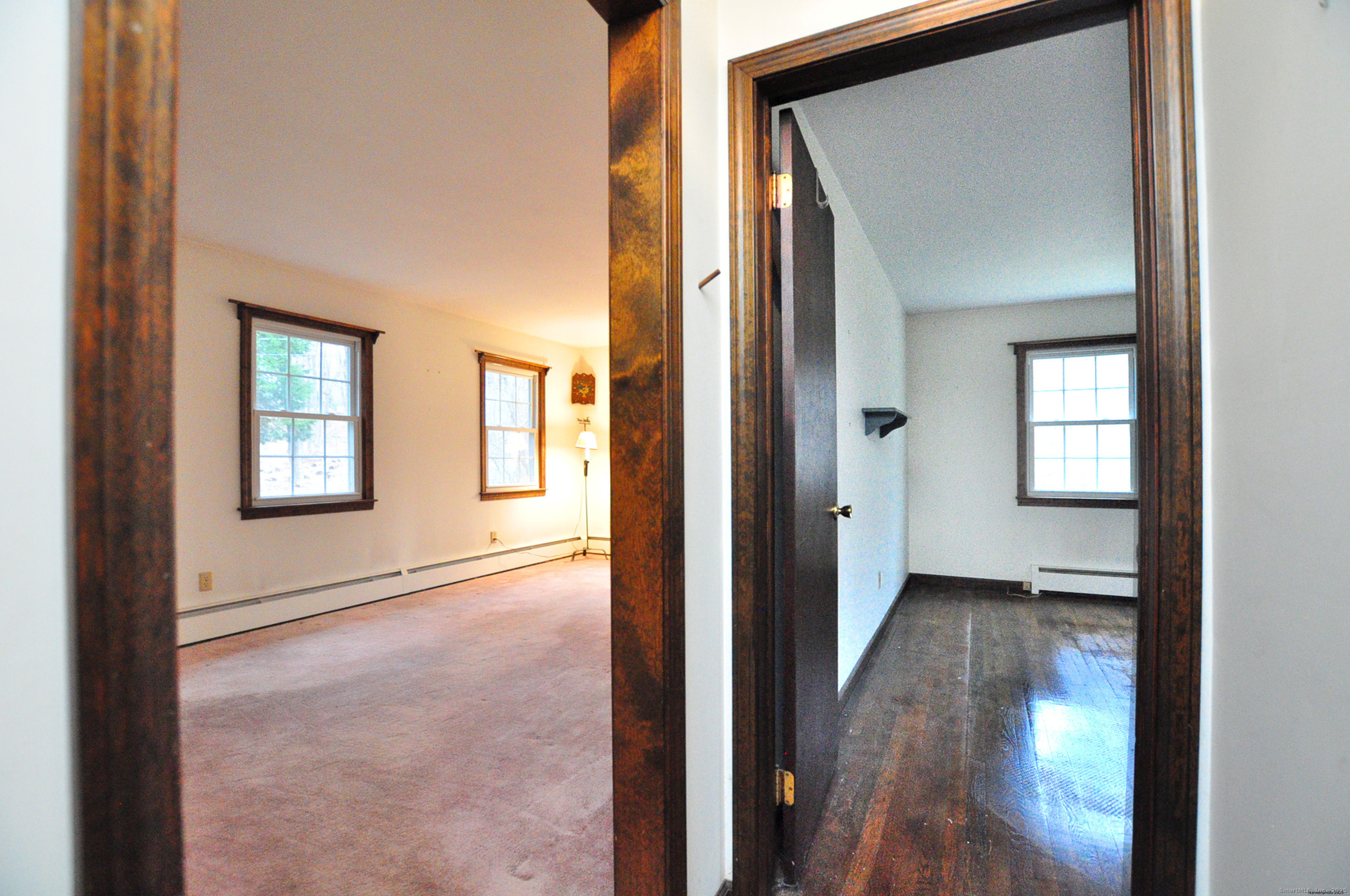 913 Jeremy Swamp Road Southbury, CT 06488 - Photo 12 of 31 Living room and entrance to what was used as a dining room