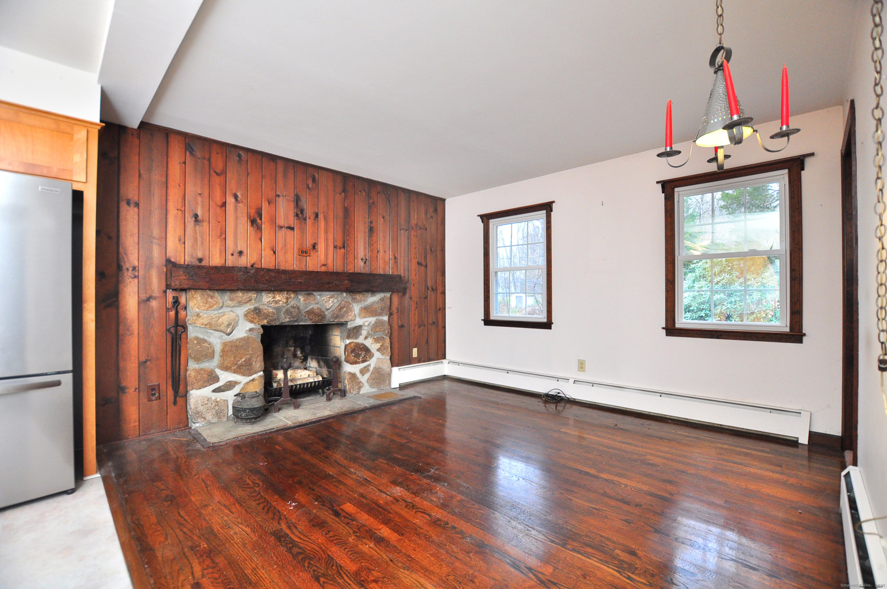 913 Jeremy Swamp Road Southbury, CT 06488 - Photo 5 of 31 Woodburning fireplace in breakfast room/family room