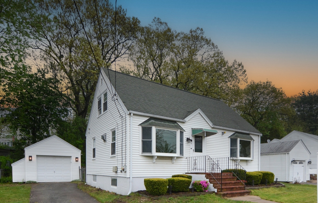 95 Sunset Avenue Dedham, MA 02026 - Photo 1 of 39 a front view of a house with garage