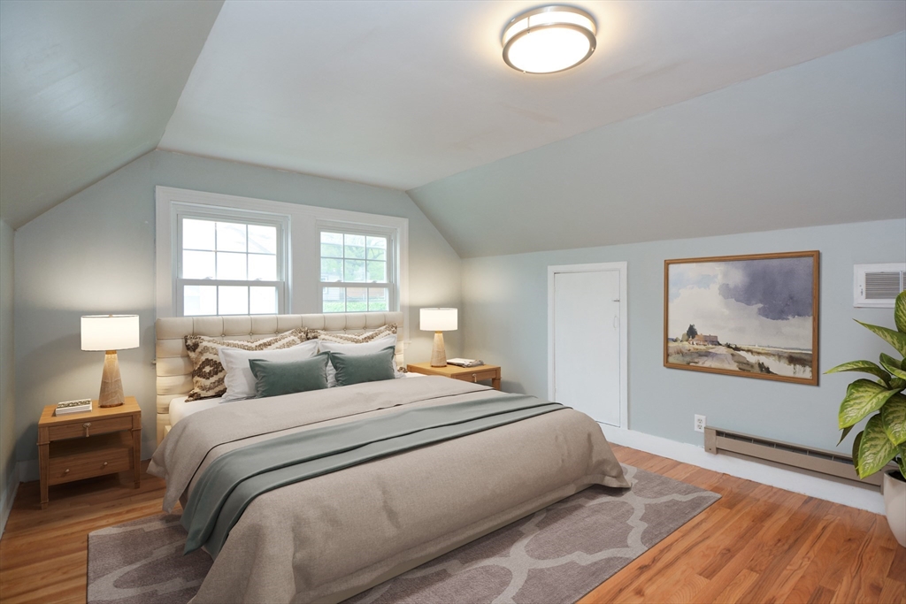 95 Sunset Avenue Dedham, MA 02026 - Photo 2 of 39 a bedroom with a bed and a painting on the wall