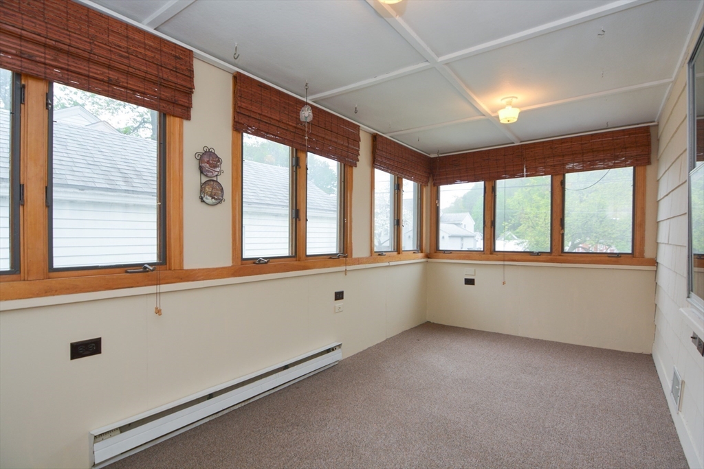 95 Sunset Avenue Dedham, MA 02026 - Photo 27 of 39 a view of an empty room with a window
