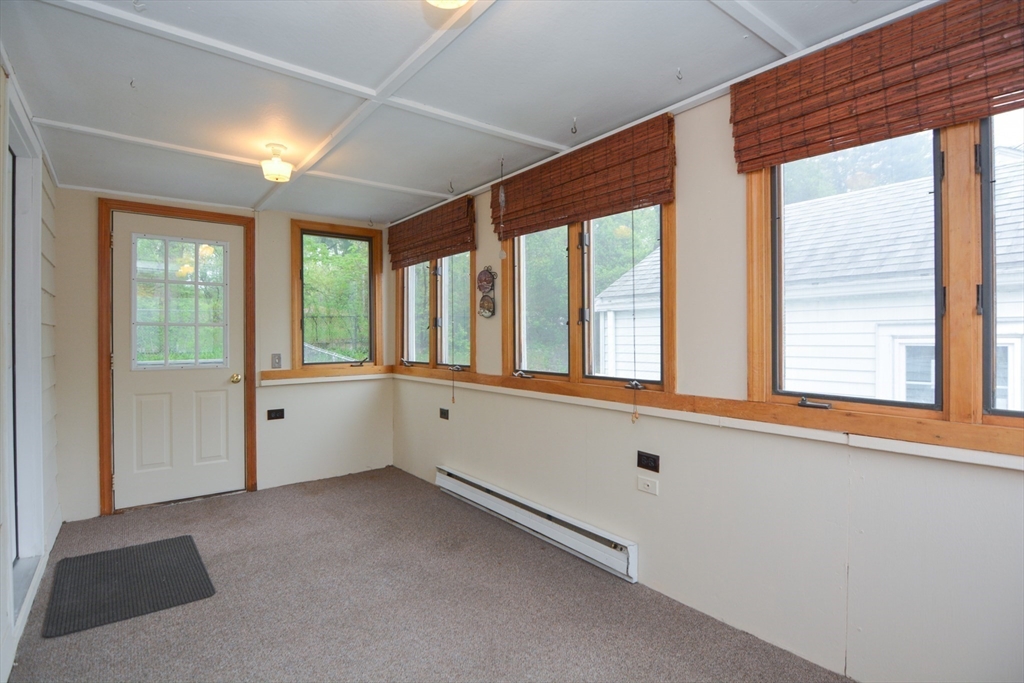 95 Sunset Avenue Dedham, MA 02026 - Photo 28 of 39 a view of an empty room with a window