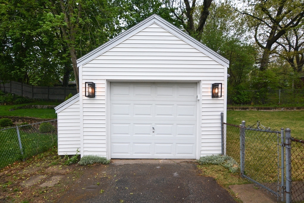 95 Sunset Avenue Dedham, MA 02026 - Photo 36 of 39 a view of a house with a yard