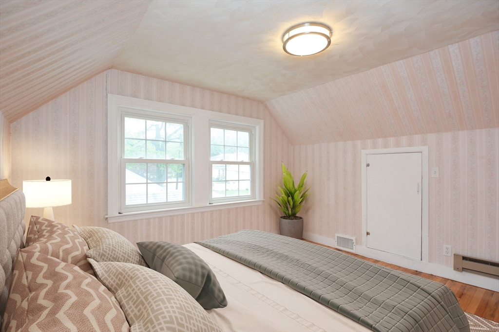 95 Sunset Avenue Dedham, MA 02026 - Photo 6 of 39 a bedroom with a bed and a window