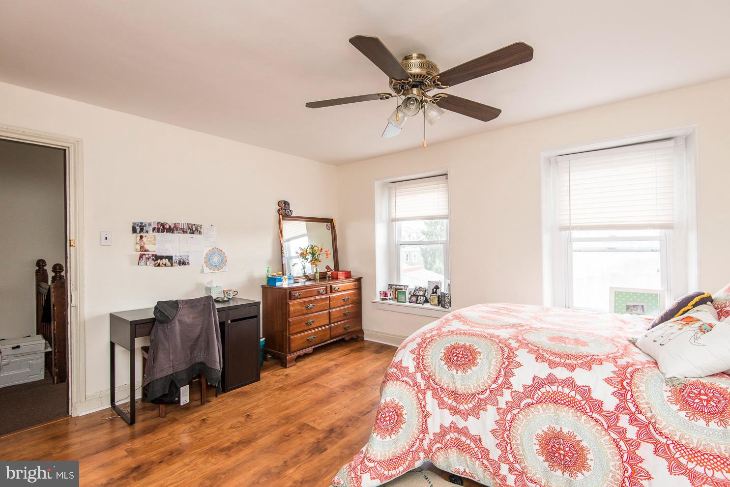 133 Dupont Street Philadelphia, PA 19127 - Photo 20 of 24 a bedroom with a bed and wooden floor