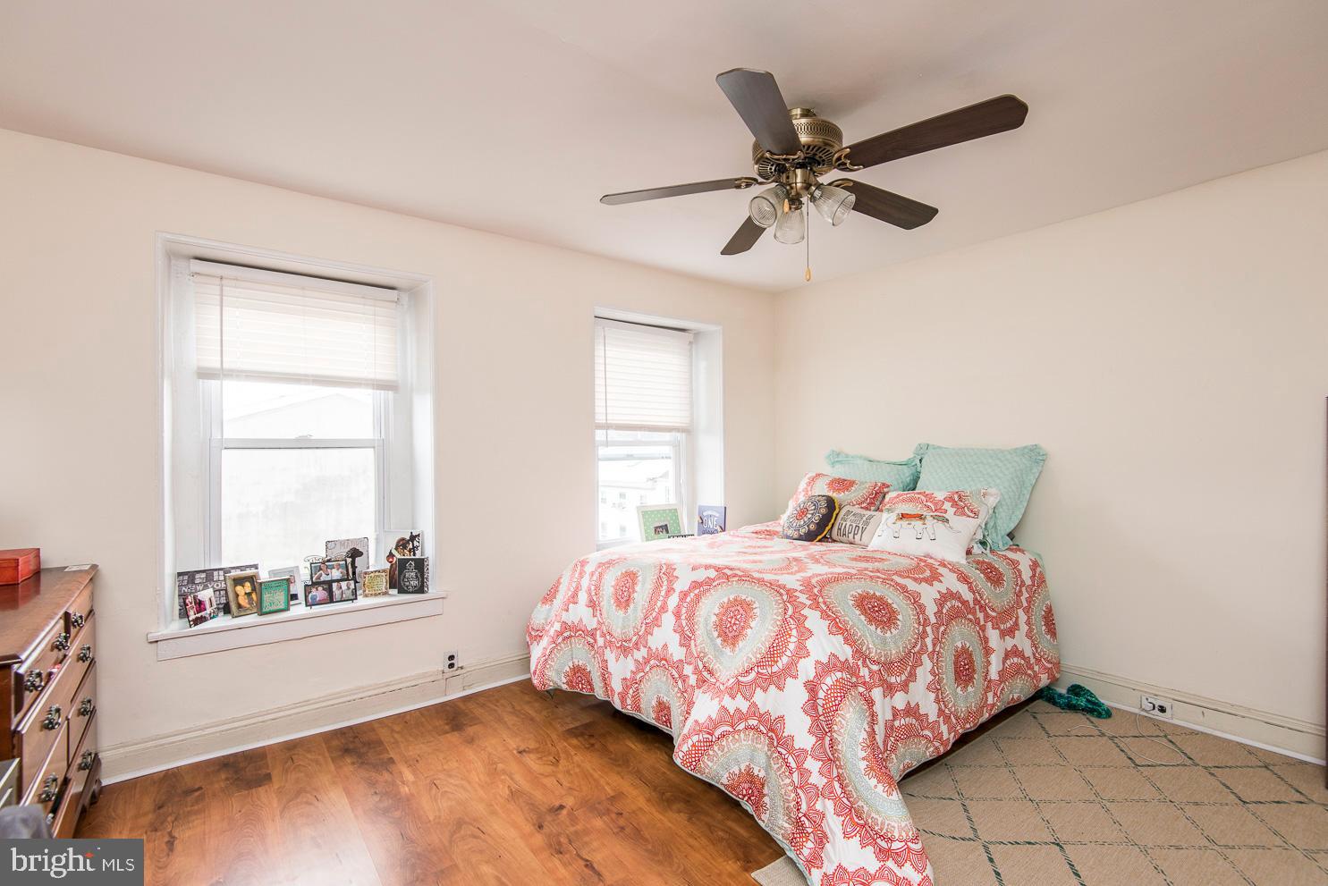 133 Dupont Street Philadelphia, PA 19127 - Photo 21 of 24 a bedroom with a bed and window