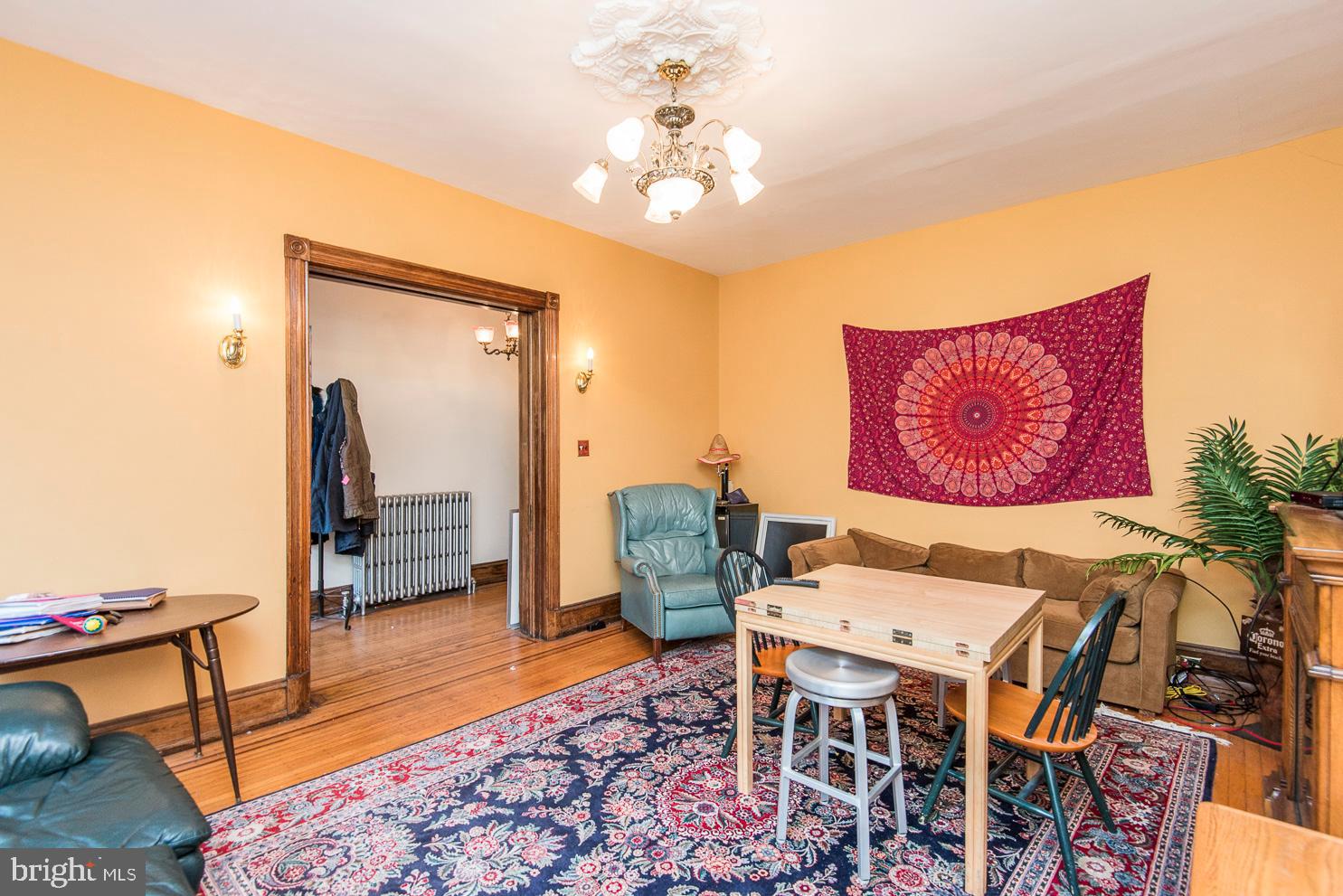 133 Dupont Street Philadelphia, PA 19127 - Photo 6 of 24 a dining room with furniture and wooden floor
