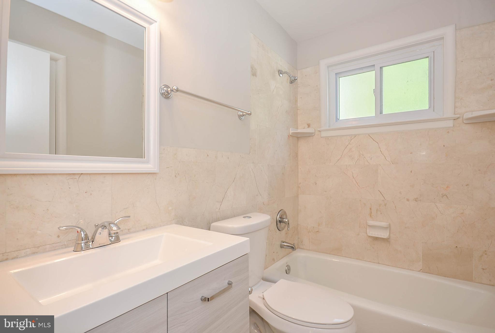 10116 Brunswick Avenue Silver Spring, MD 20902 - Photo 12 of 28 Main level bath