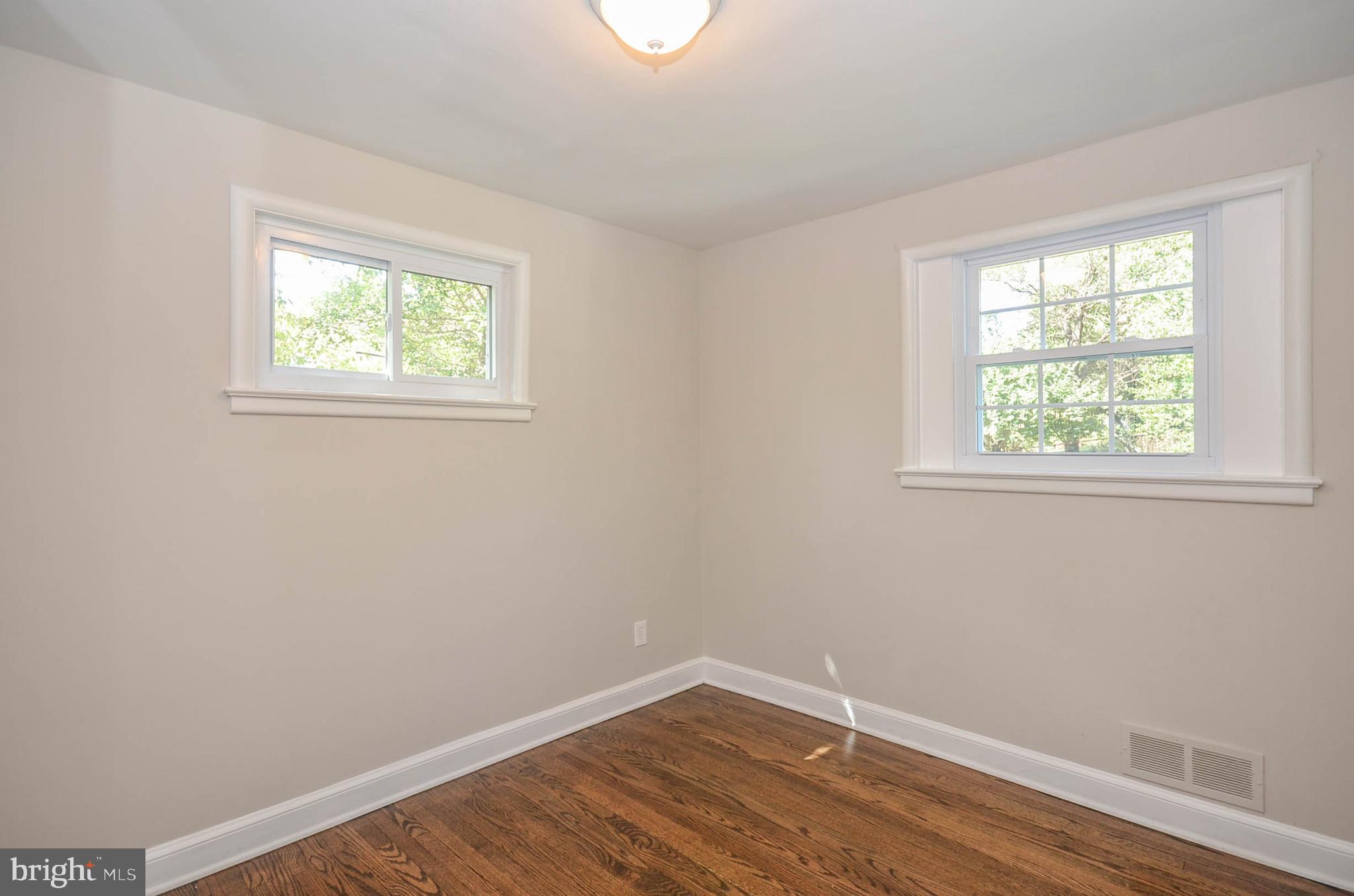 10116 Brunswick Avenue Silver Spring, MD 20902 - Photo 13 of 28 Main level bedroom 2