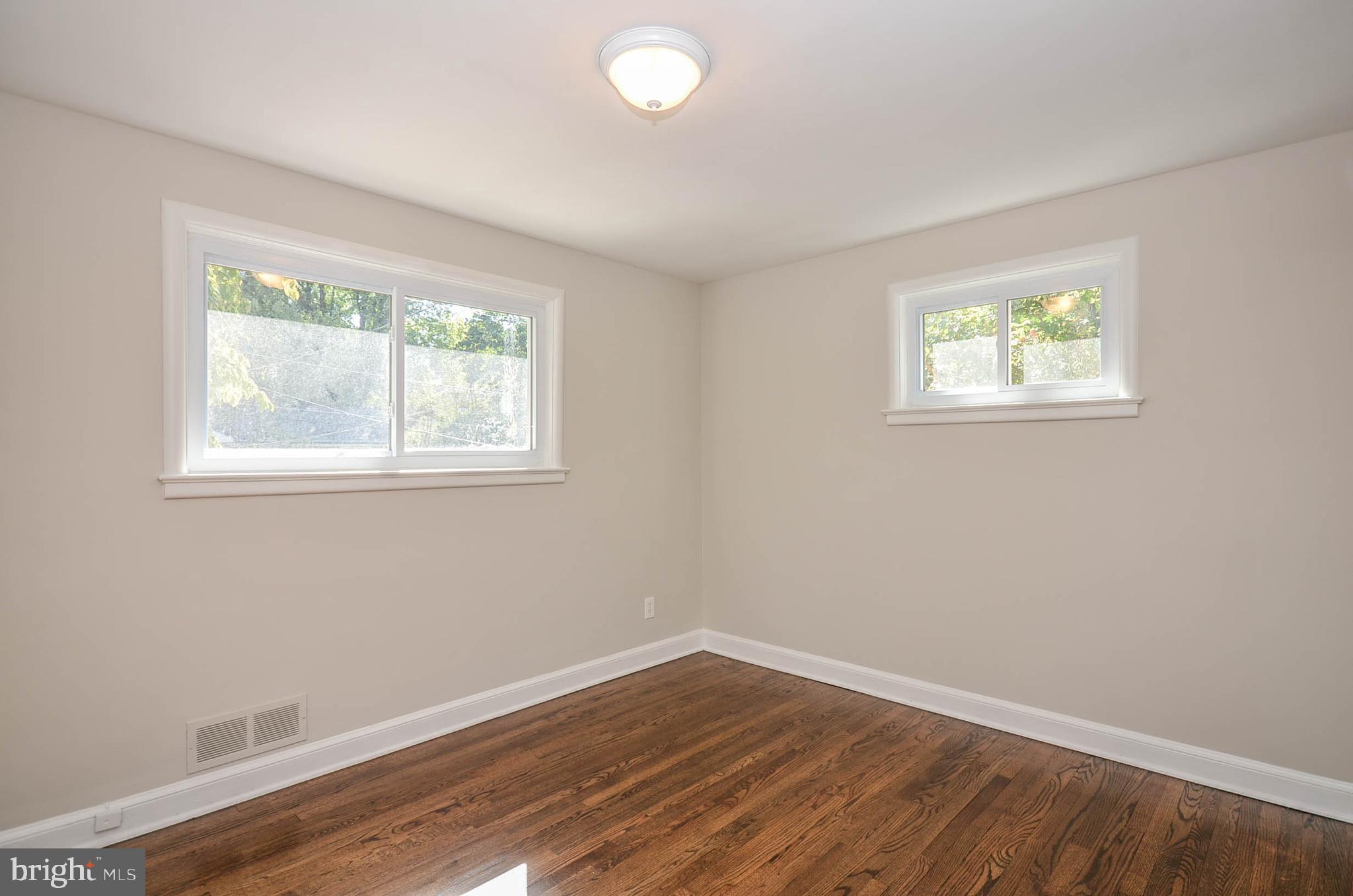 10116 Brunswick Avenue Silver Spring, MD 20902 - Photo 15 of 28 Main level bedroom 3