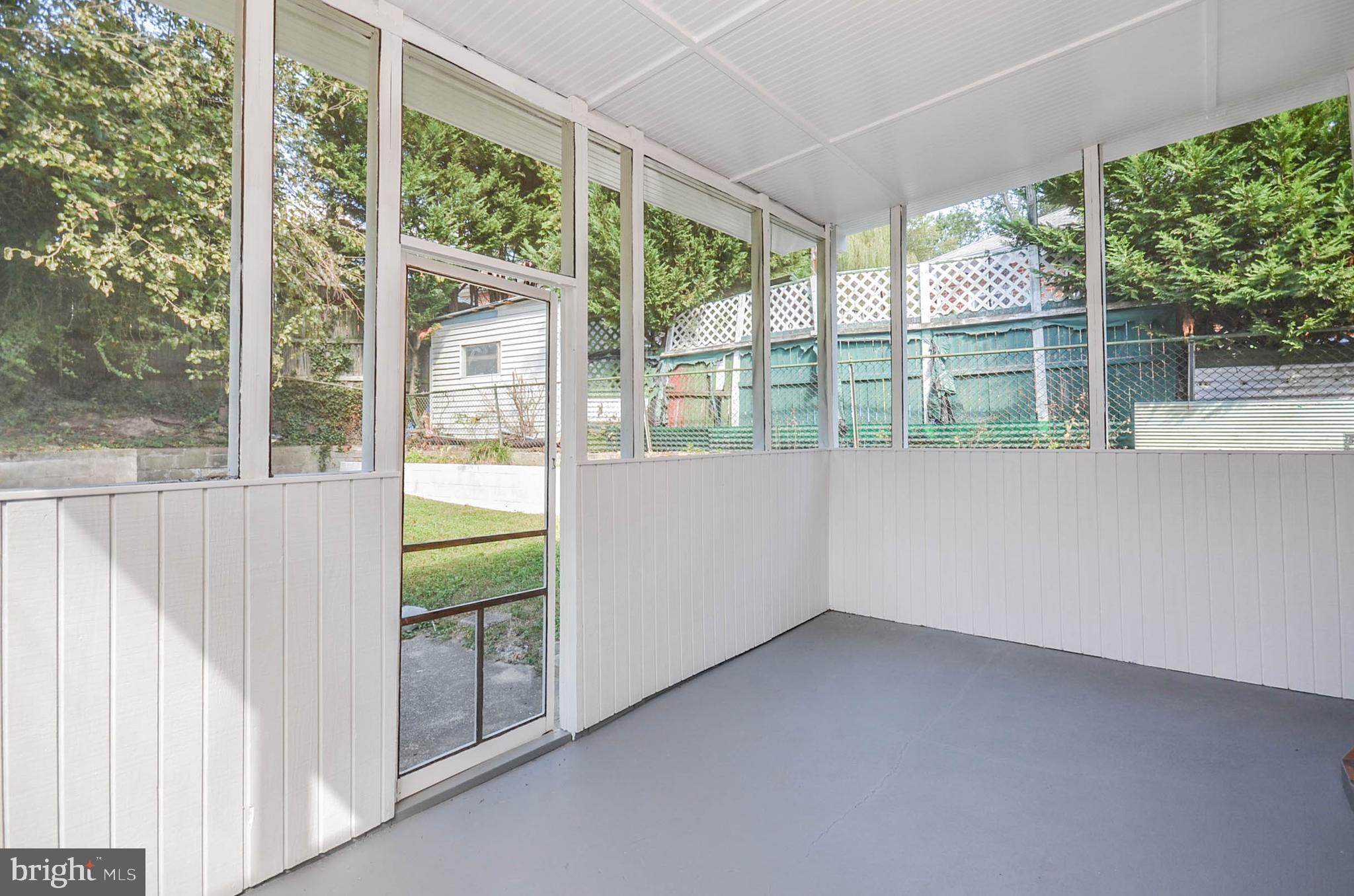 10116 Brunswick Avenue Silver Spring, MD 20902 - Photo 17 of 28 Enclosed back porch