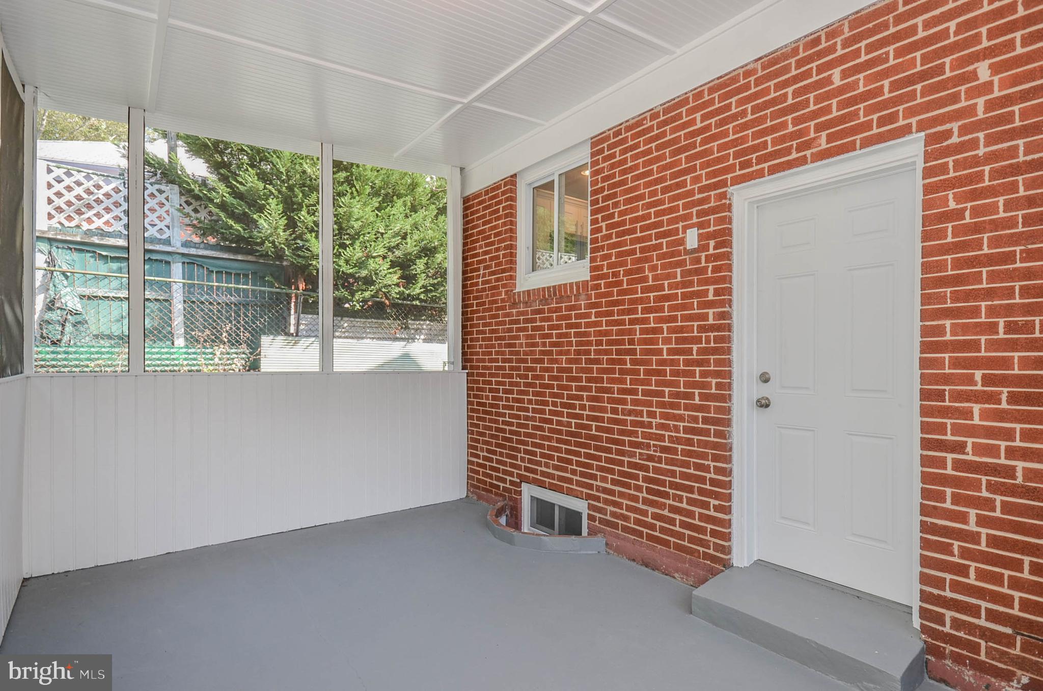 10116 Brunswick Avenue Silver Spring, MD 20902 - Photo 18 of 28 Enclosed back porch
