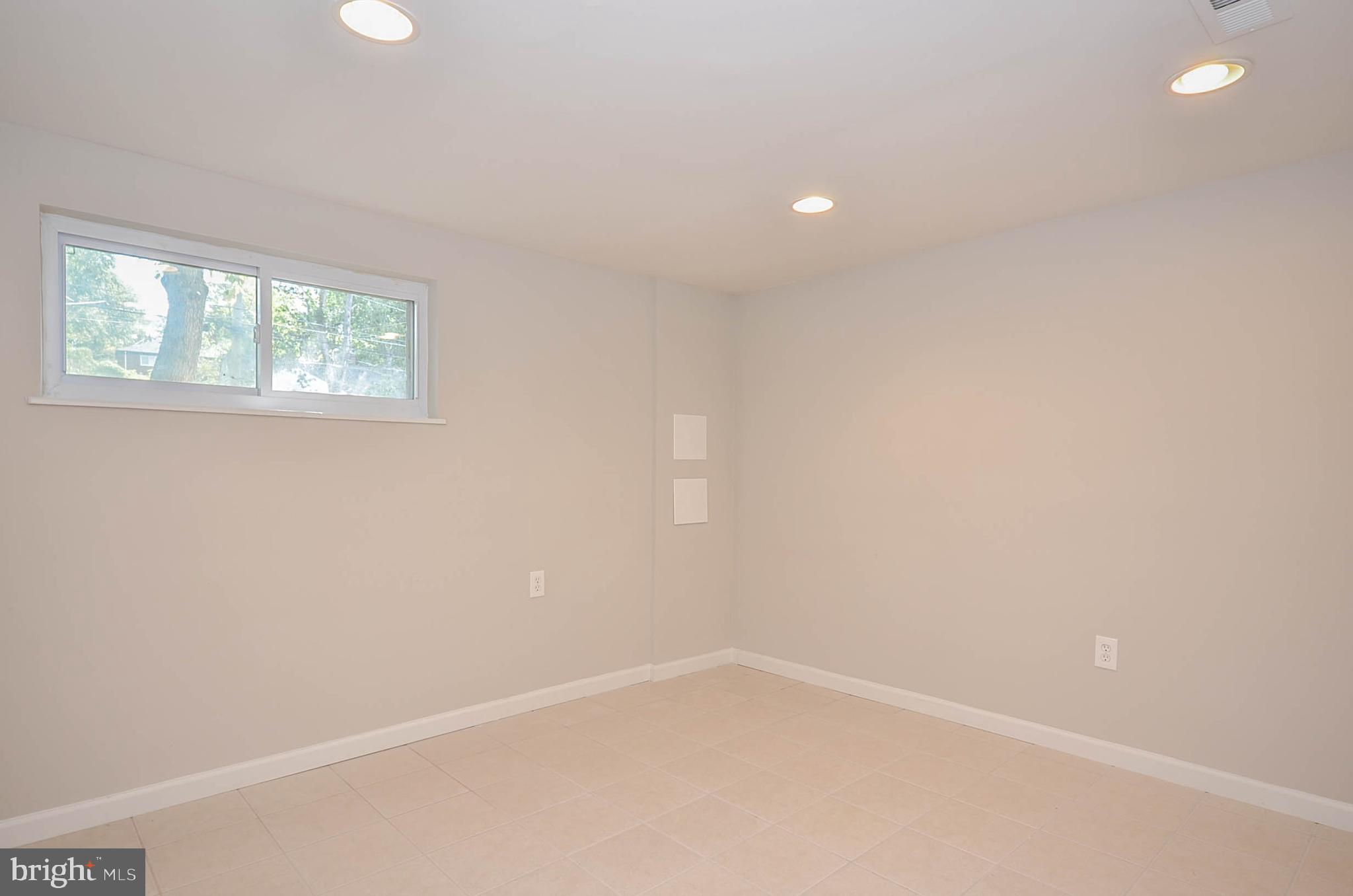 10116 Brunswick Avenue Silver Spring, MD 20902 - Photo 22 of 28 Basement bedroom