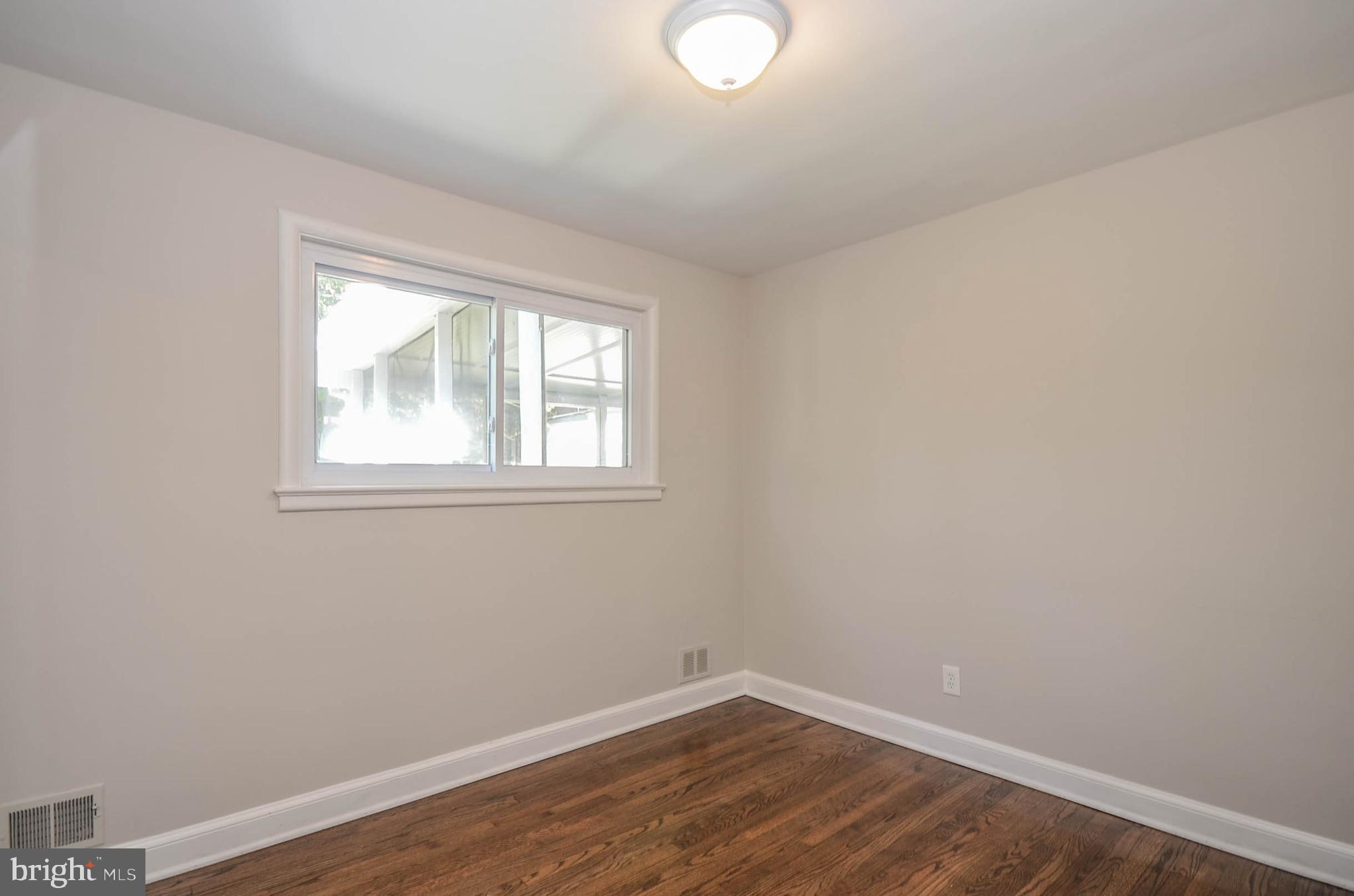10116 Brunswick Avenue Silver Spring, MD 20902 - Photo 10 of 28 Main level bedroom 1