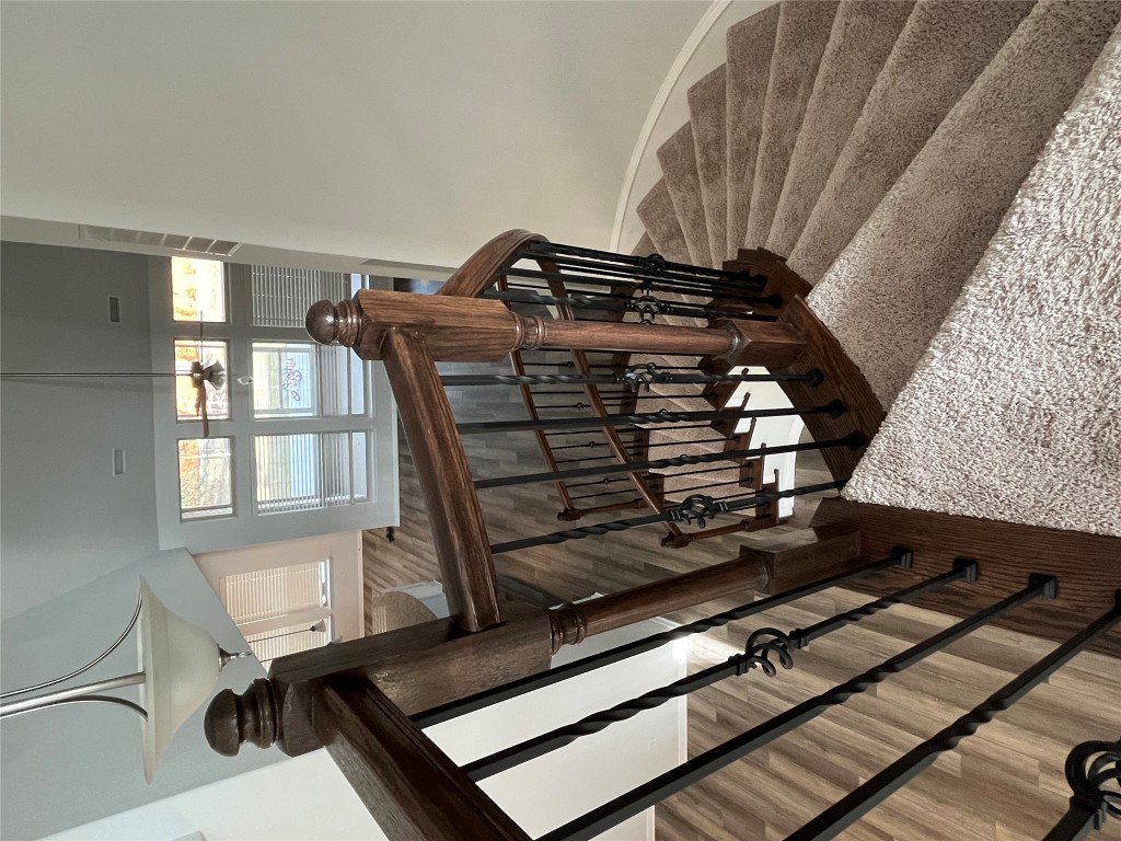 121 Red Granite Road Georgetown, TX 78633 - Photo 19 of 23 Stairs featuring wood finished floors and baseboards