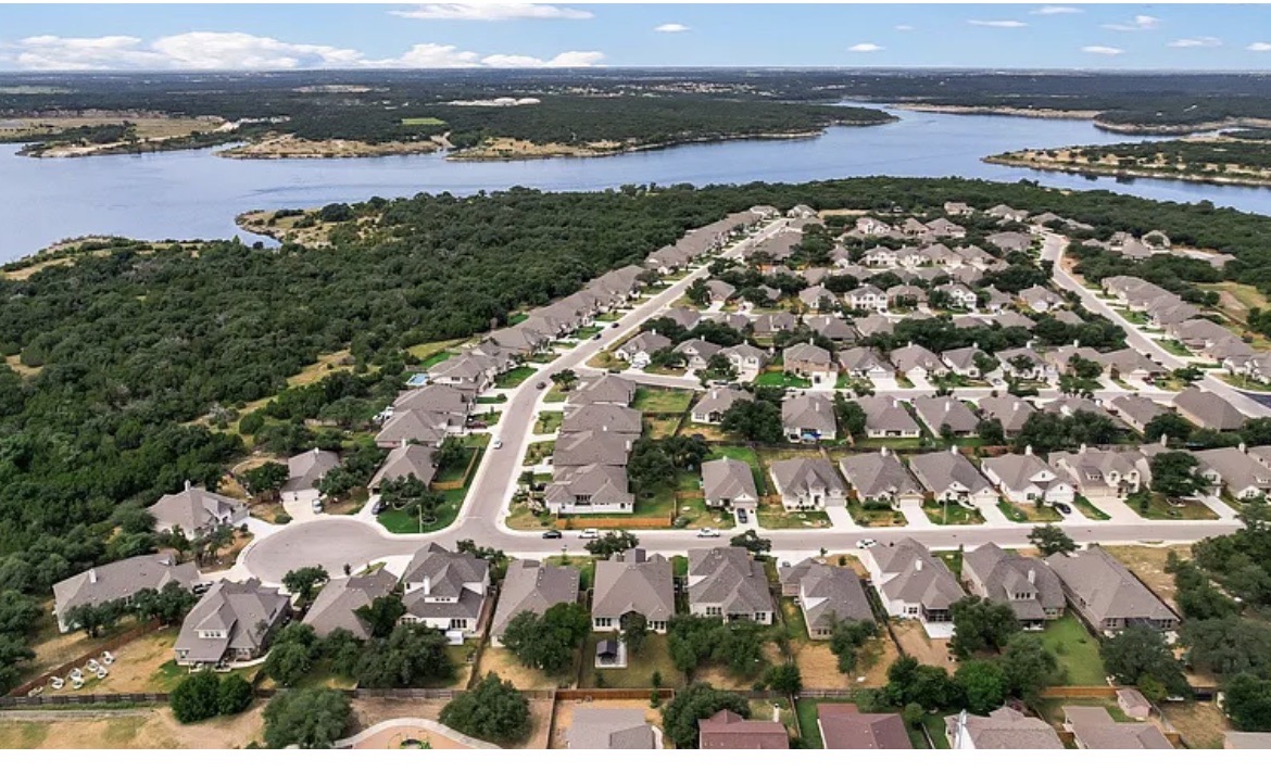 121 Red Granite Road Georgetown, TX 78633 - Photo 2 of 26 a view of lake with city