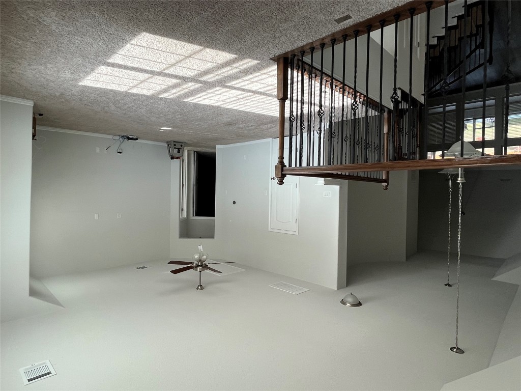 121 Red Granite Road Georgetown, TX 78633 - Photo 10 of 23 Carpeted game room with ceiling fan
